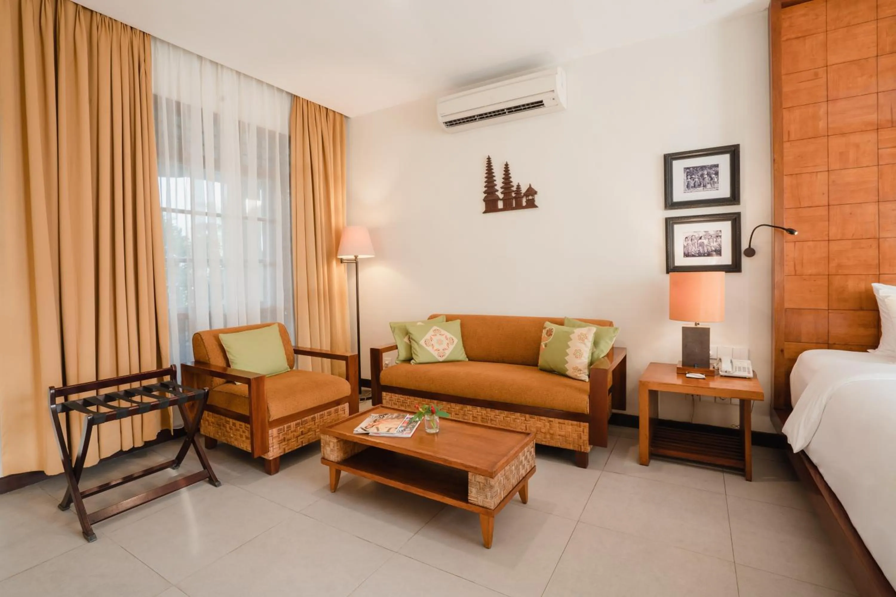 Living room, Bed in Ramayana Candidasa Beach Resort