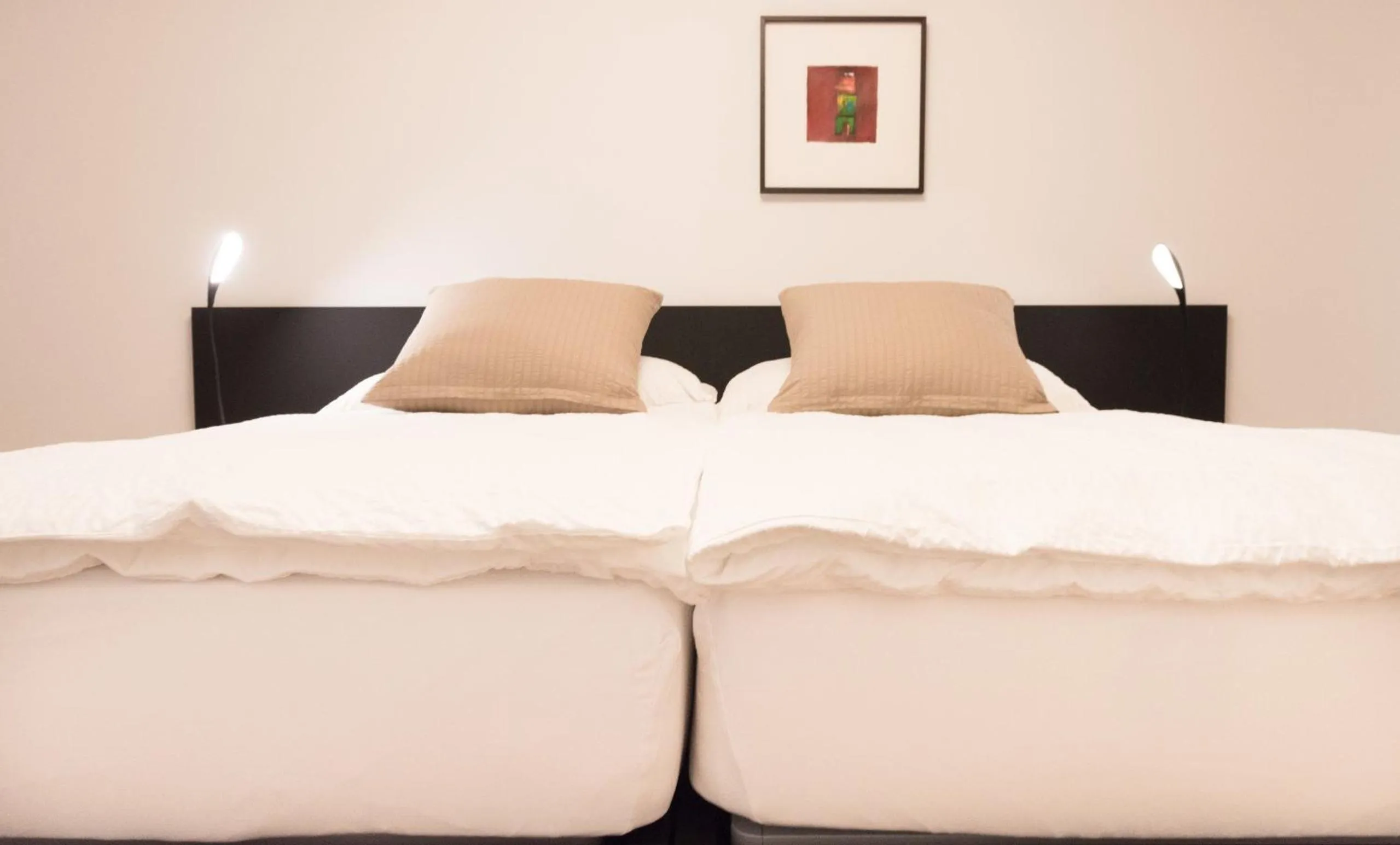 Bed in Hôtel la Croix Blanche