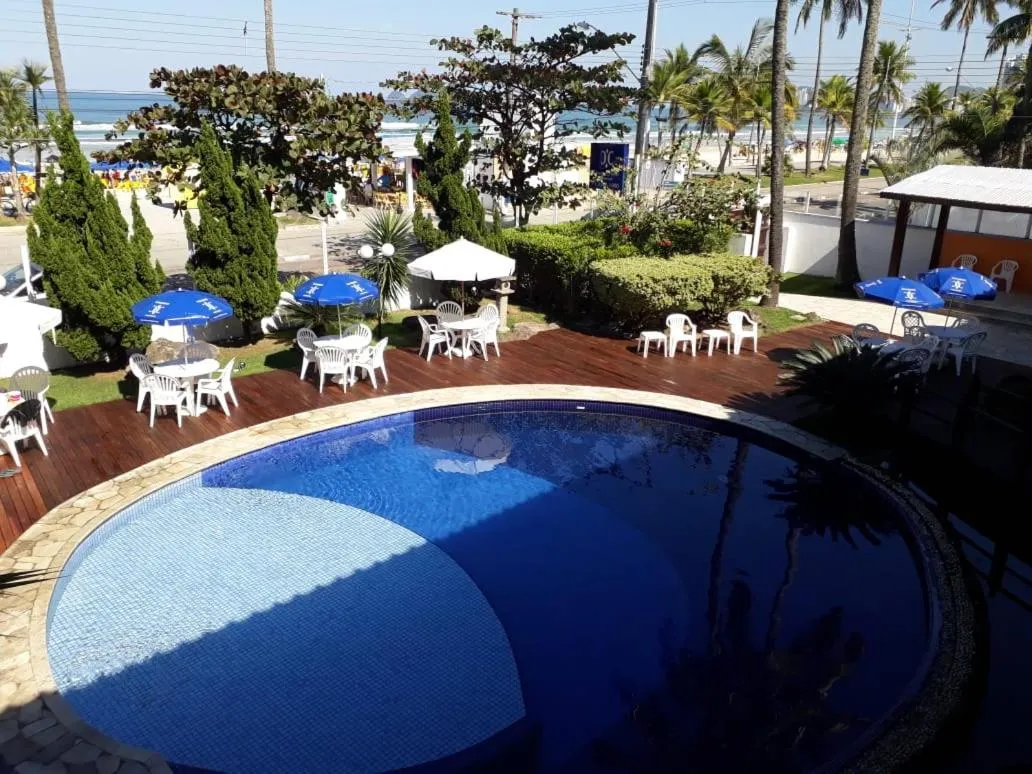 Swimming pool in Charme Hotel Guarujá Frente Mar