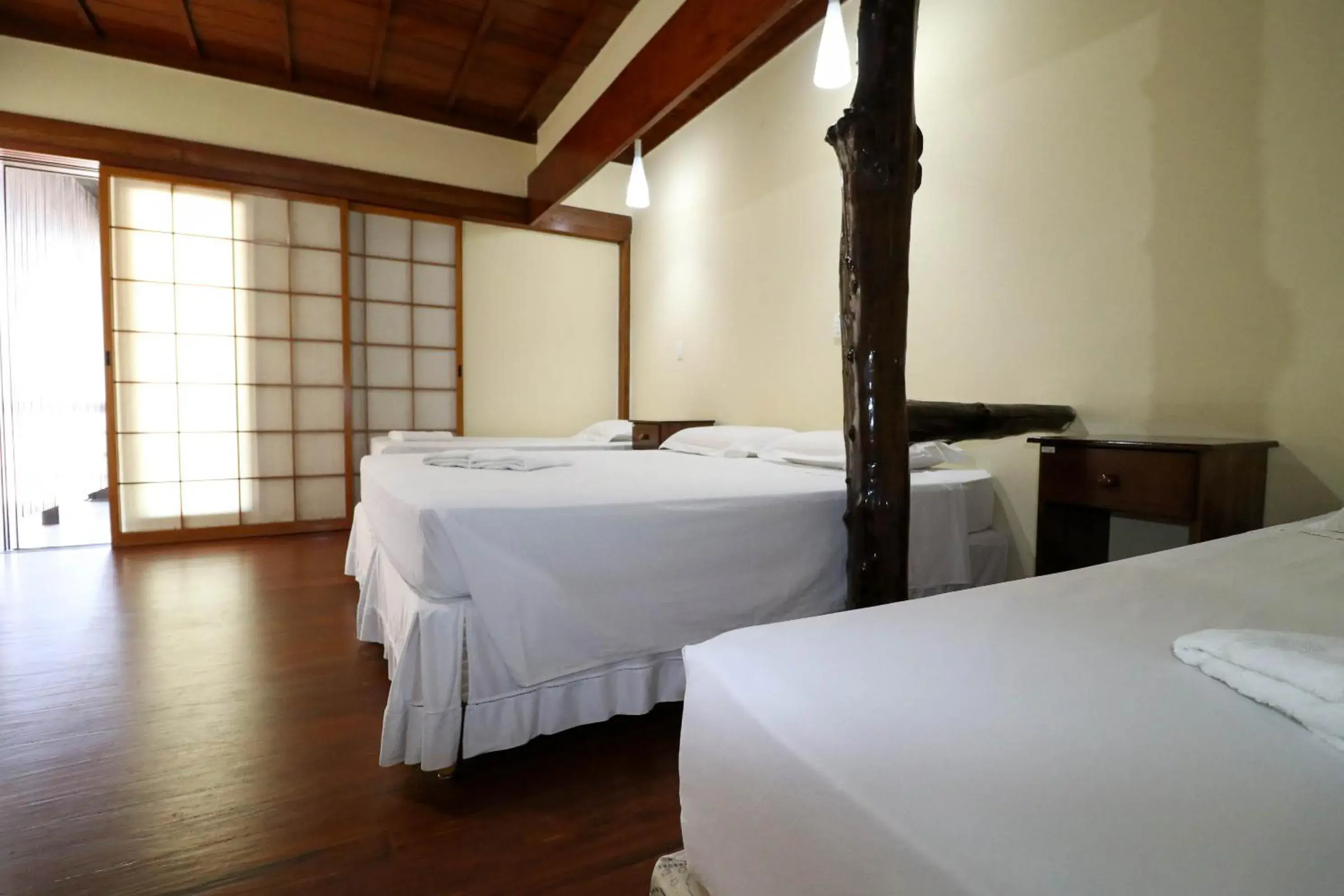 Quadruple Room with Sea View in Charme Hotel Guarujá Frente Mar Quadruple Room with Sea View in Charme Hotel Guarujá Frente Mar