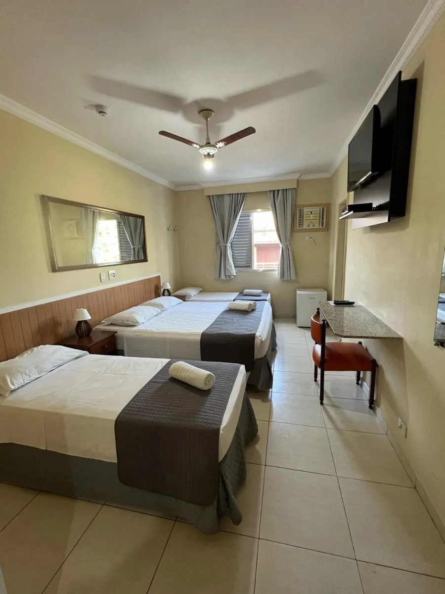 Bed in Charme Hotel Guarujá Frente Mar