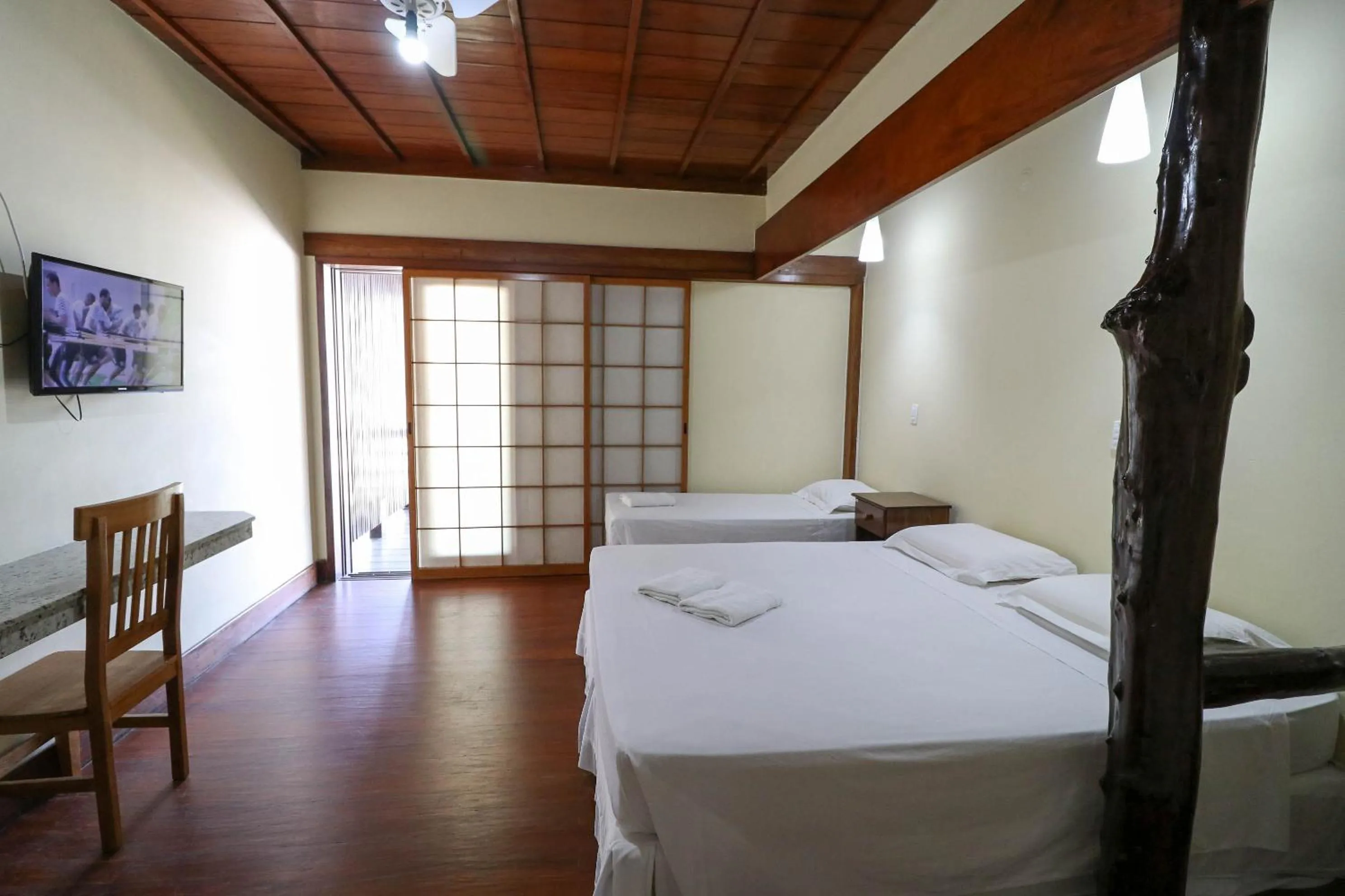 Bed in Charme Hotel Guarujá Frente Mar