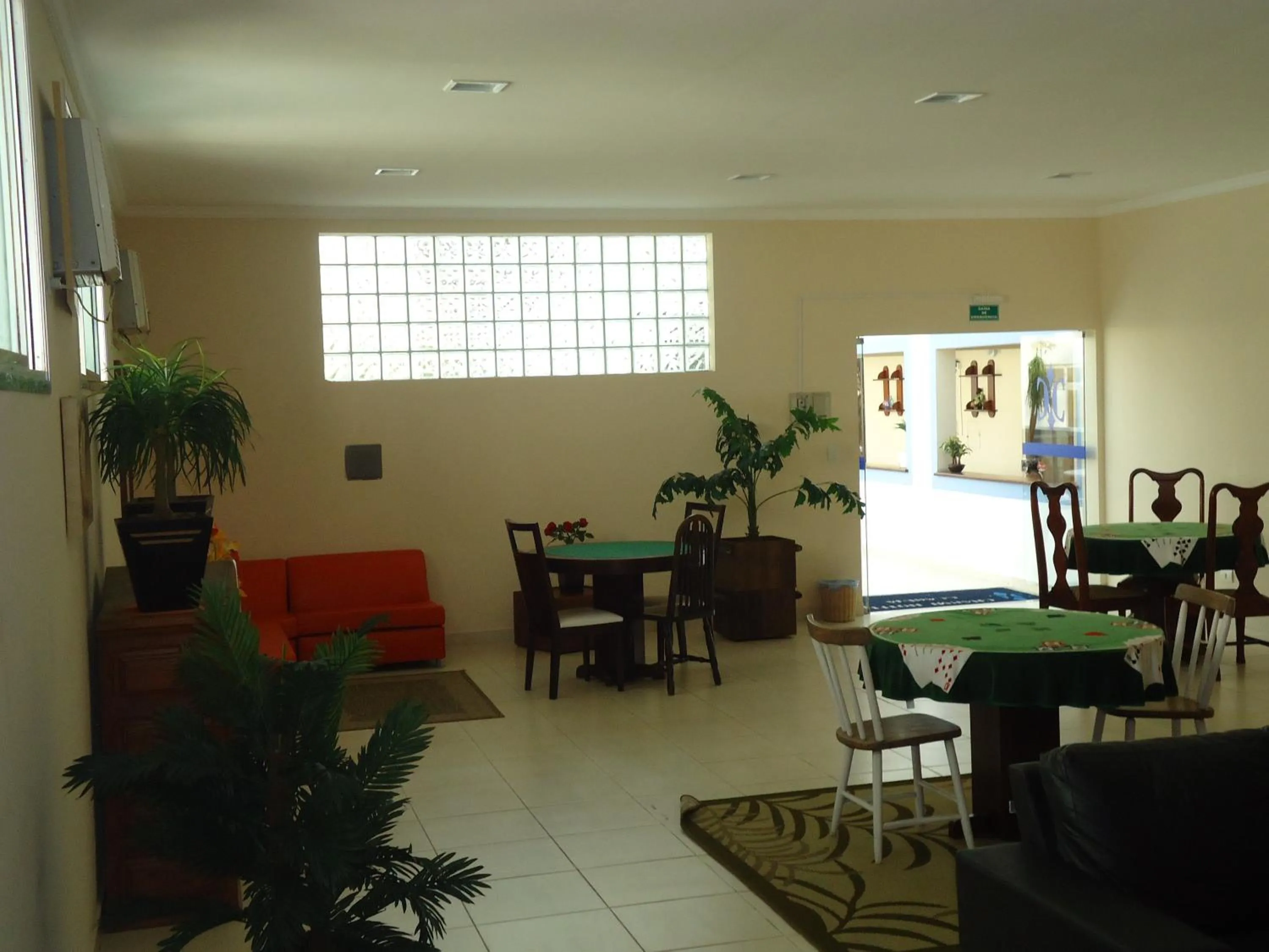 Communal lounge/ TV room in Charme Hotel Guarujá Frente Mar