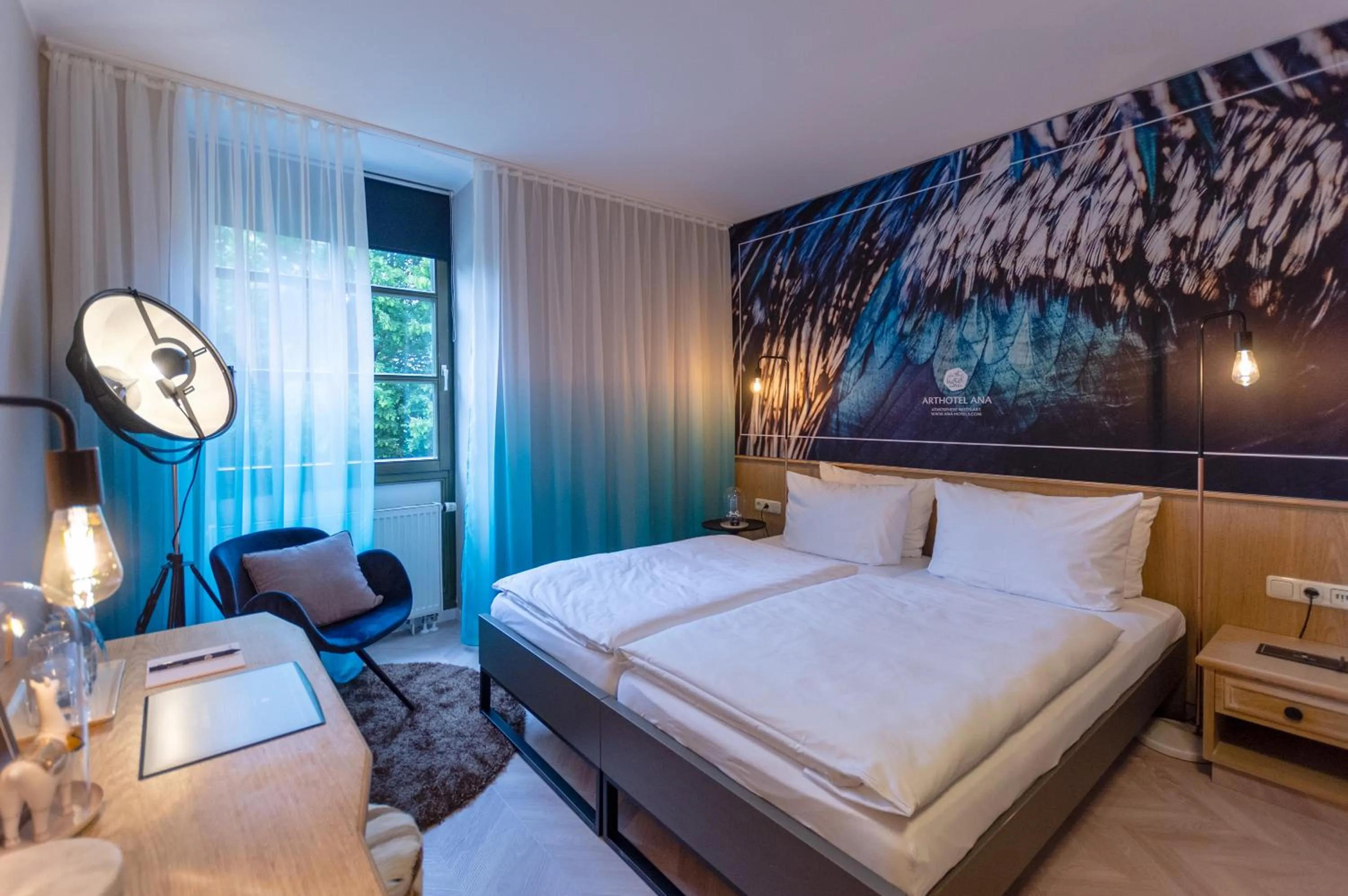 Bed in Arthotel ANA Aura