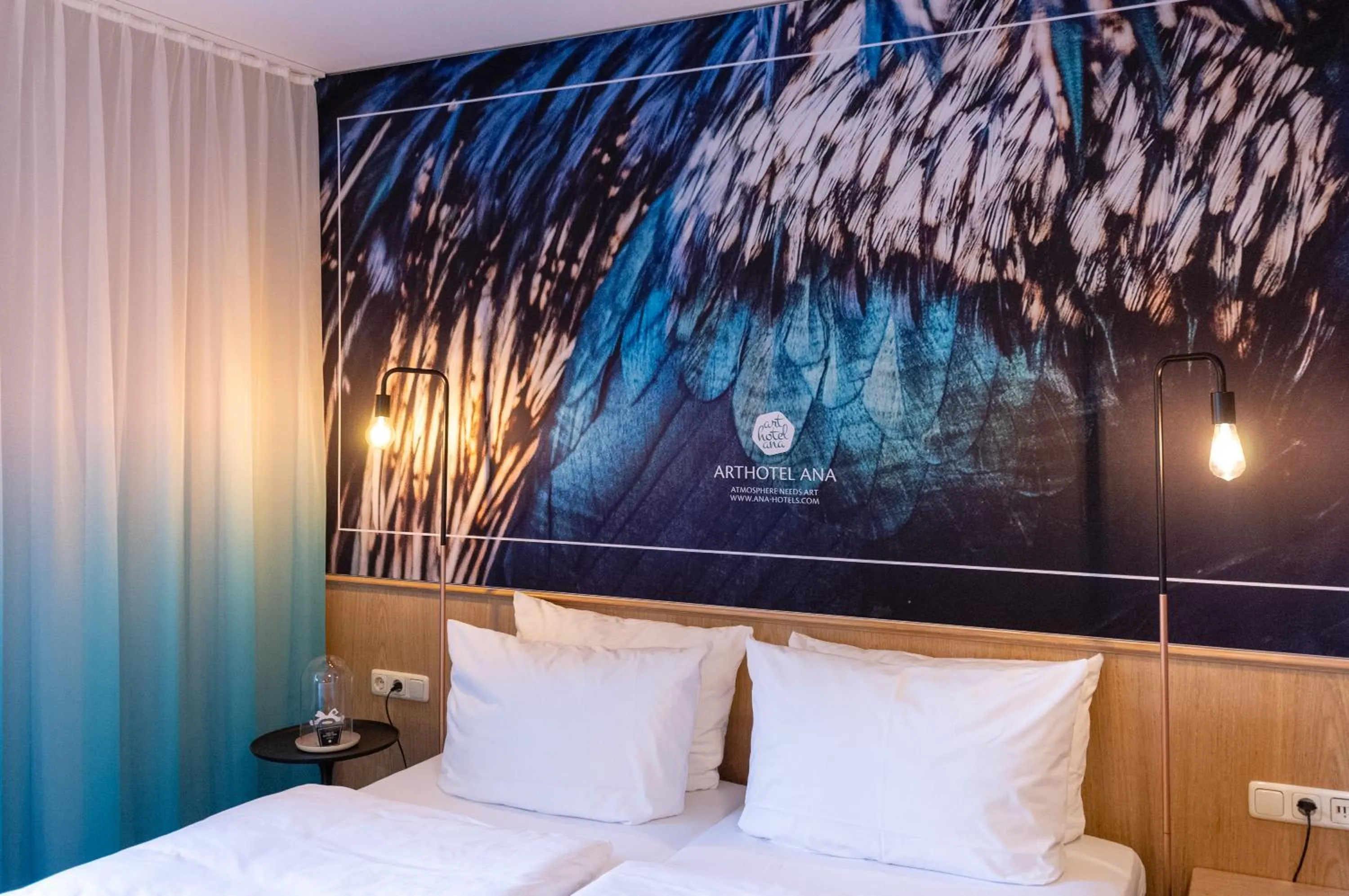 Bed in Arthotel ANA Aura