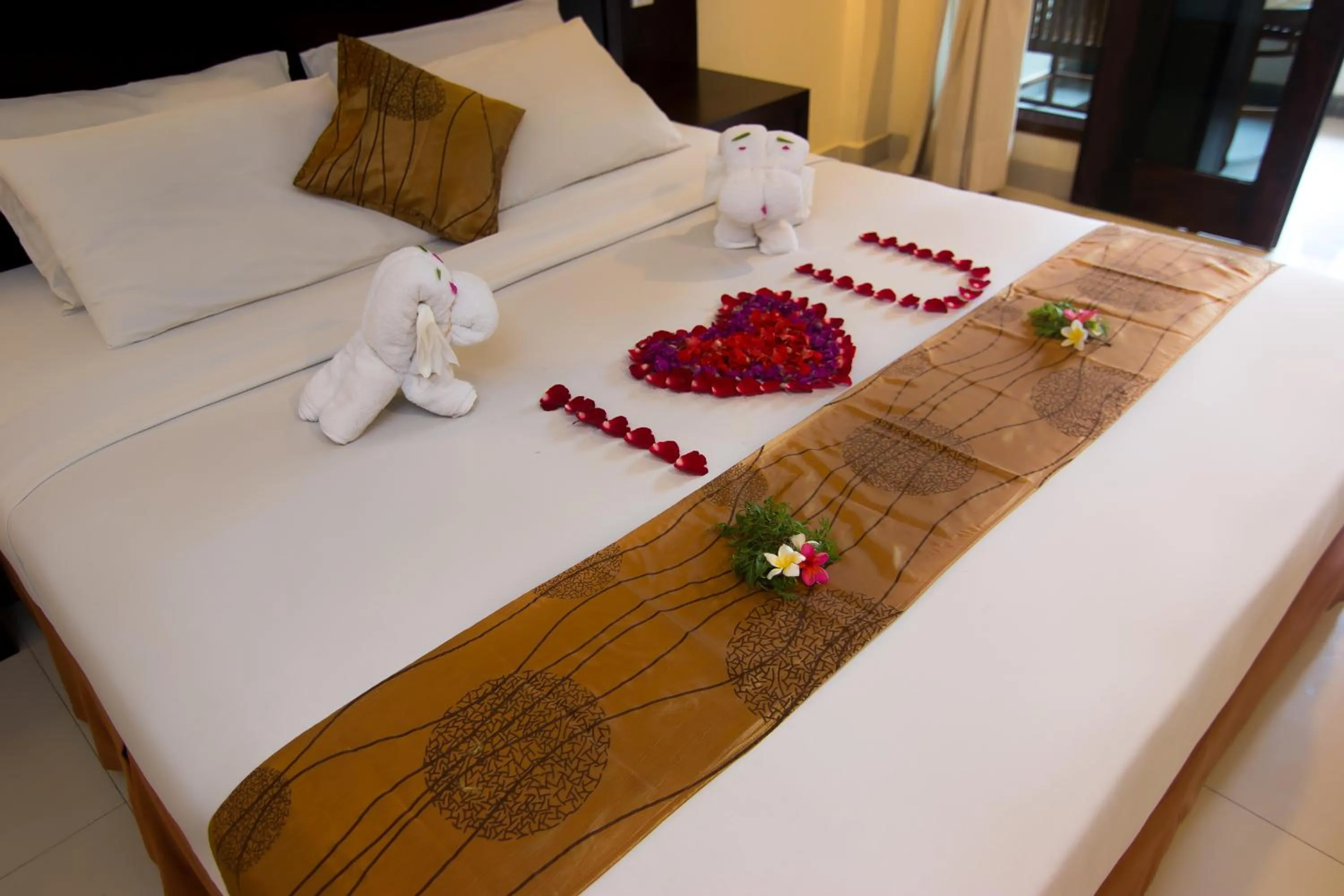 Bed in Champlung Mas Hotel Legian