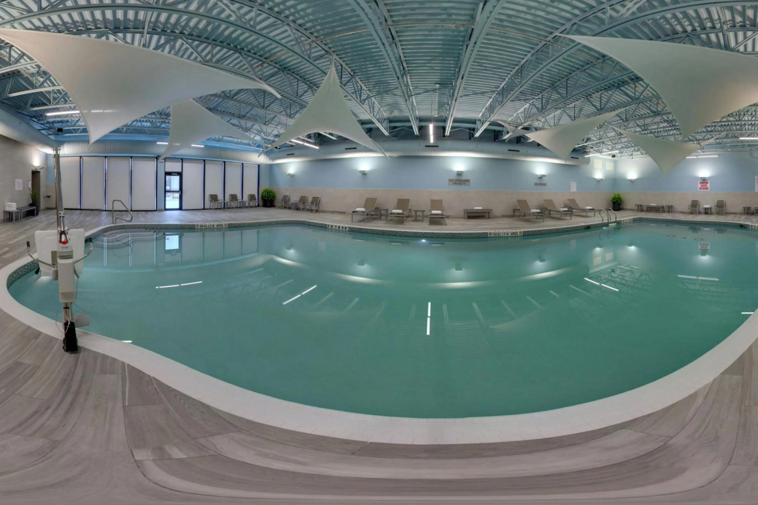 Swimming pool in TownePlace Suites by Marriott Oshawa
