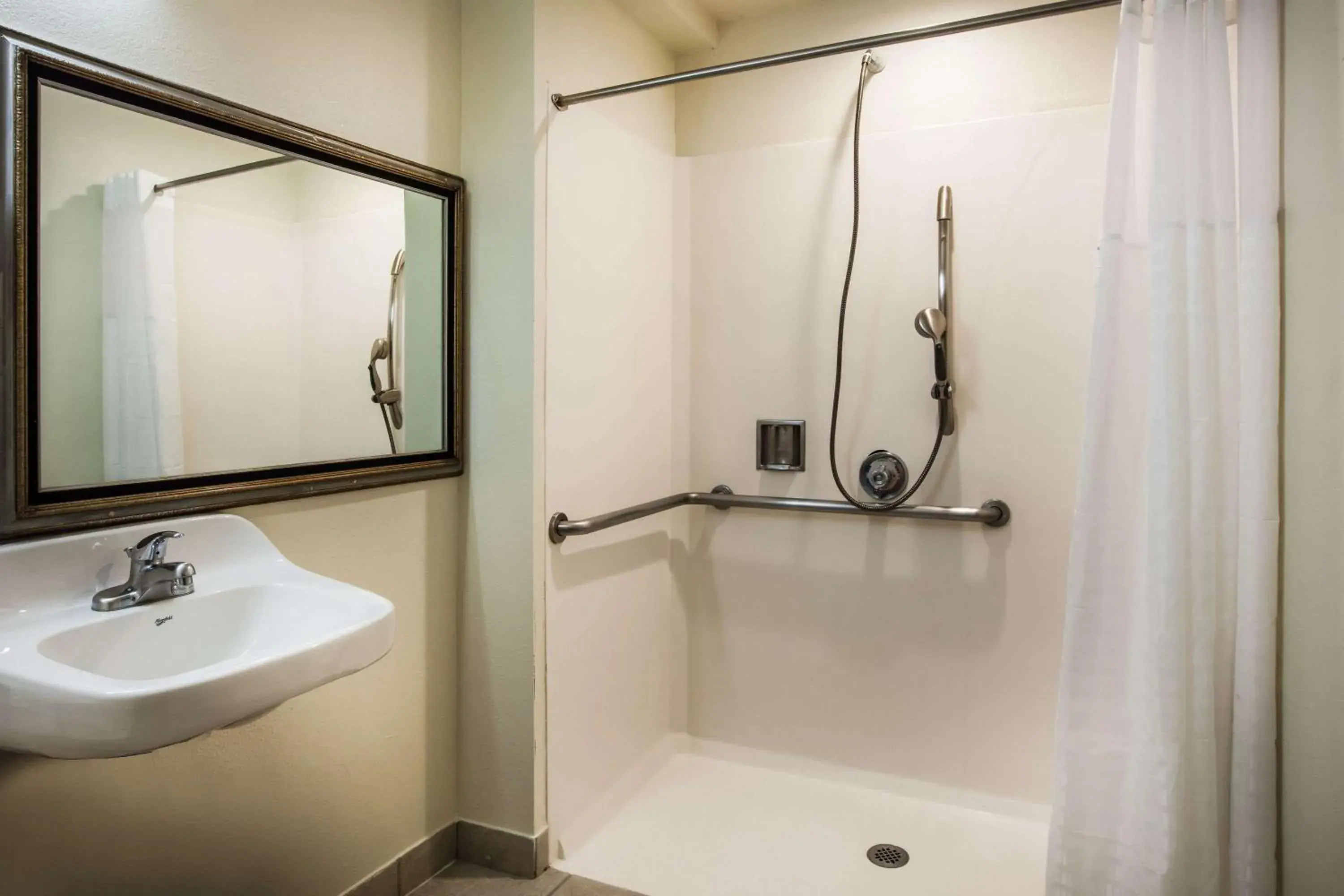 Bathroom in Days Inn & Suites by Wyndham Antioch