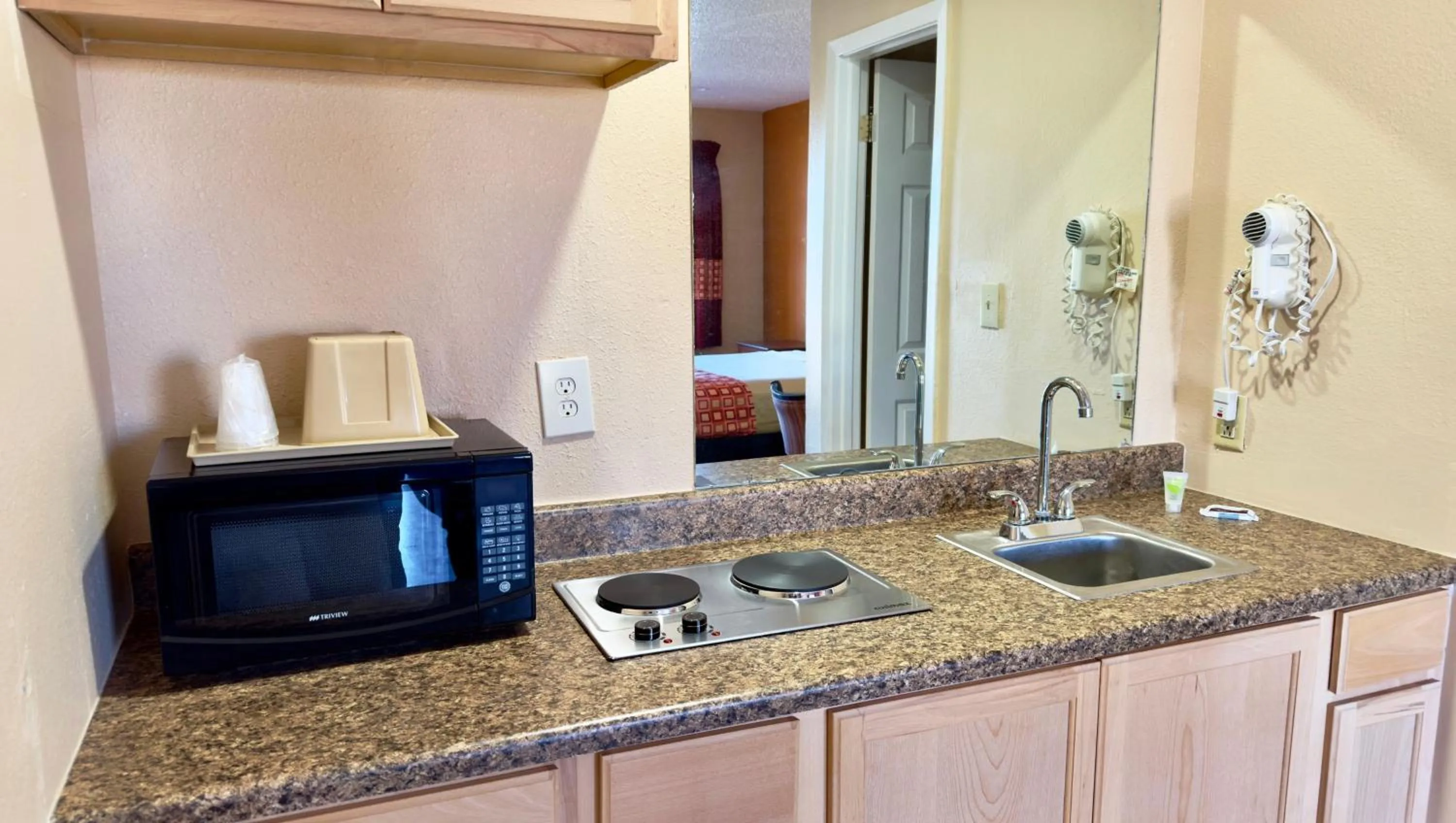 Kitchen or kitchenette in Regency Inn Hondo