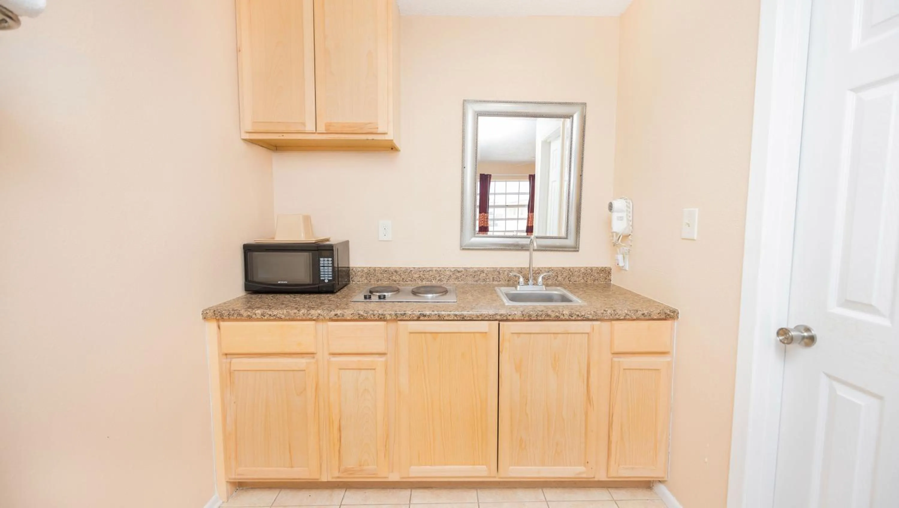 Kitchen or kitchenette in Regency Inn Hondo