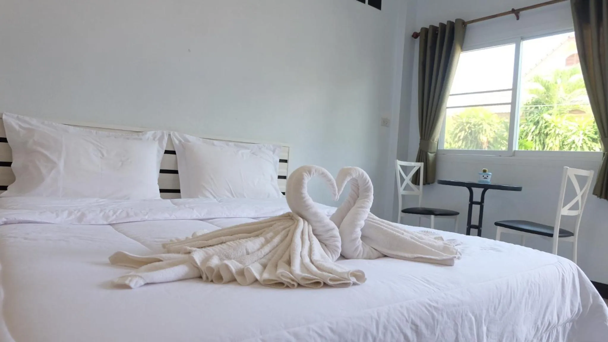 Bed in Ruen Aiyara Apartment