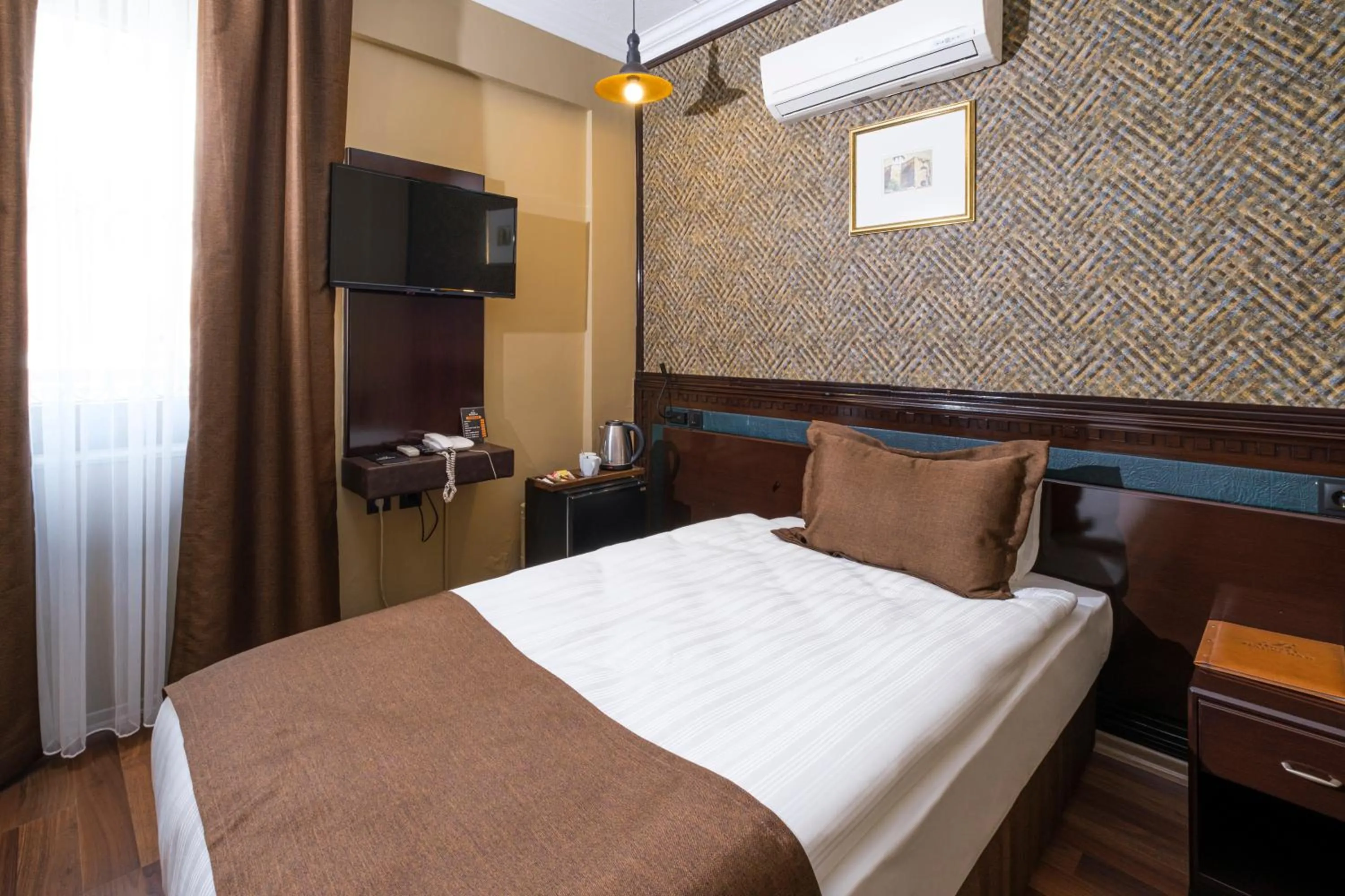 Bed in Balikcilar Hotel