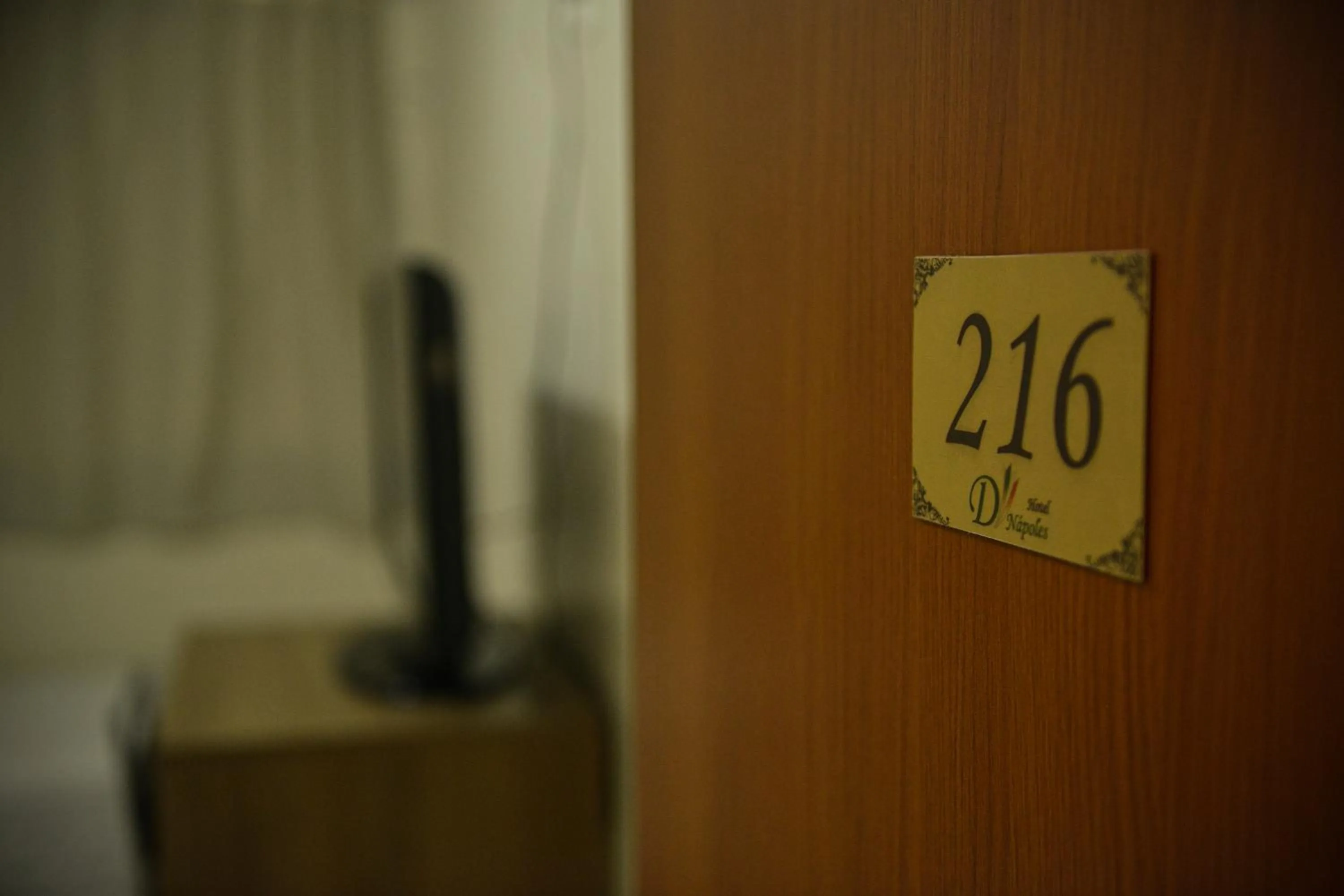 Bedroom in Hotel D'Nápoles