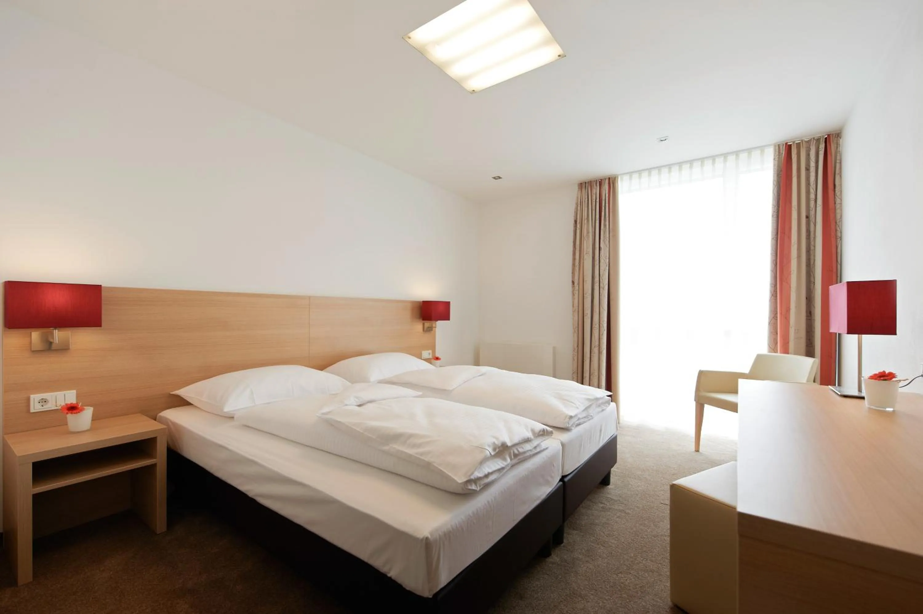 Photo of the whole room, Bed in Sternen Hotel Wolfurt