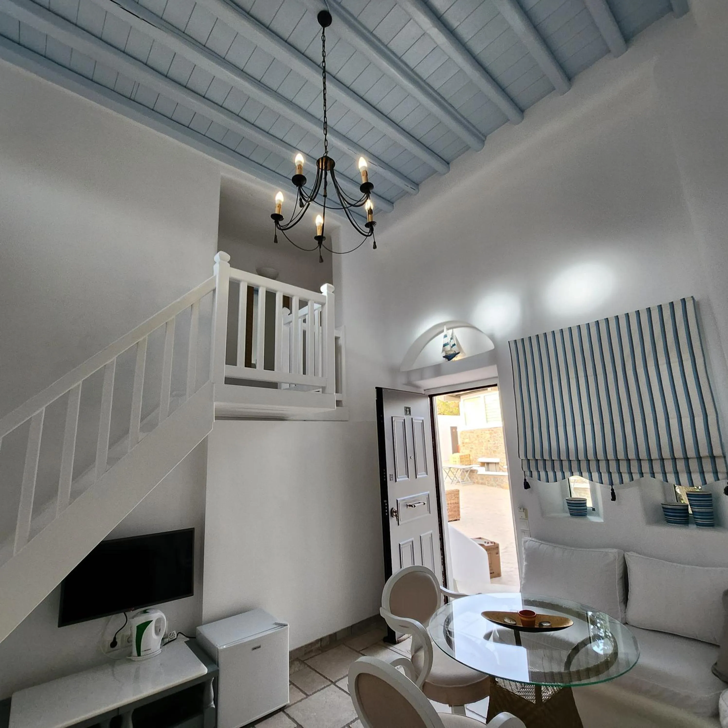 TV and multimedia in Mykonian Iros Suites & Villas