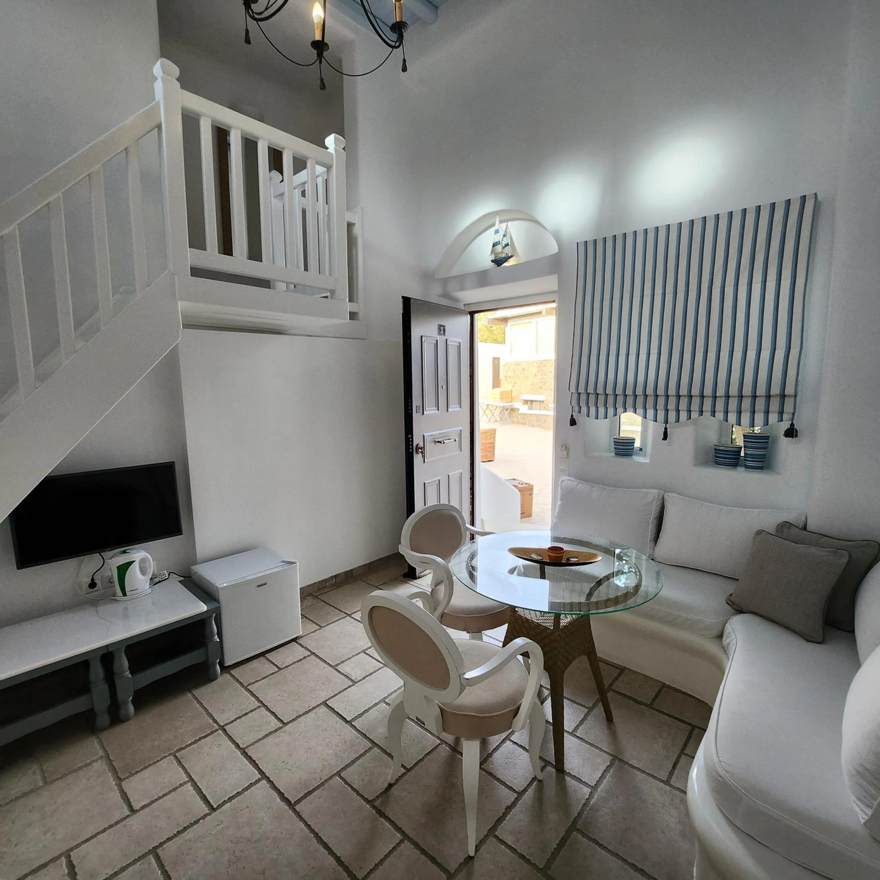 TV and multimedia in Mykonian Iros Suites & Villas