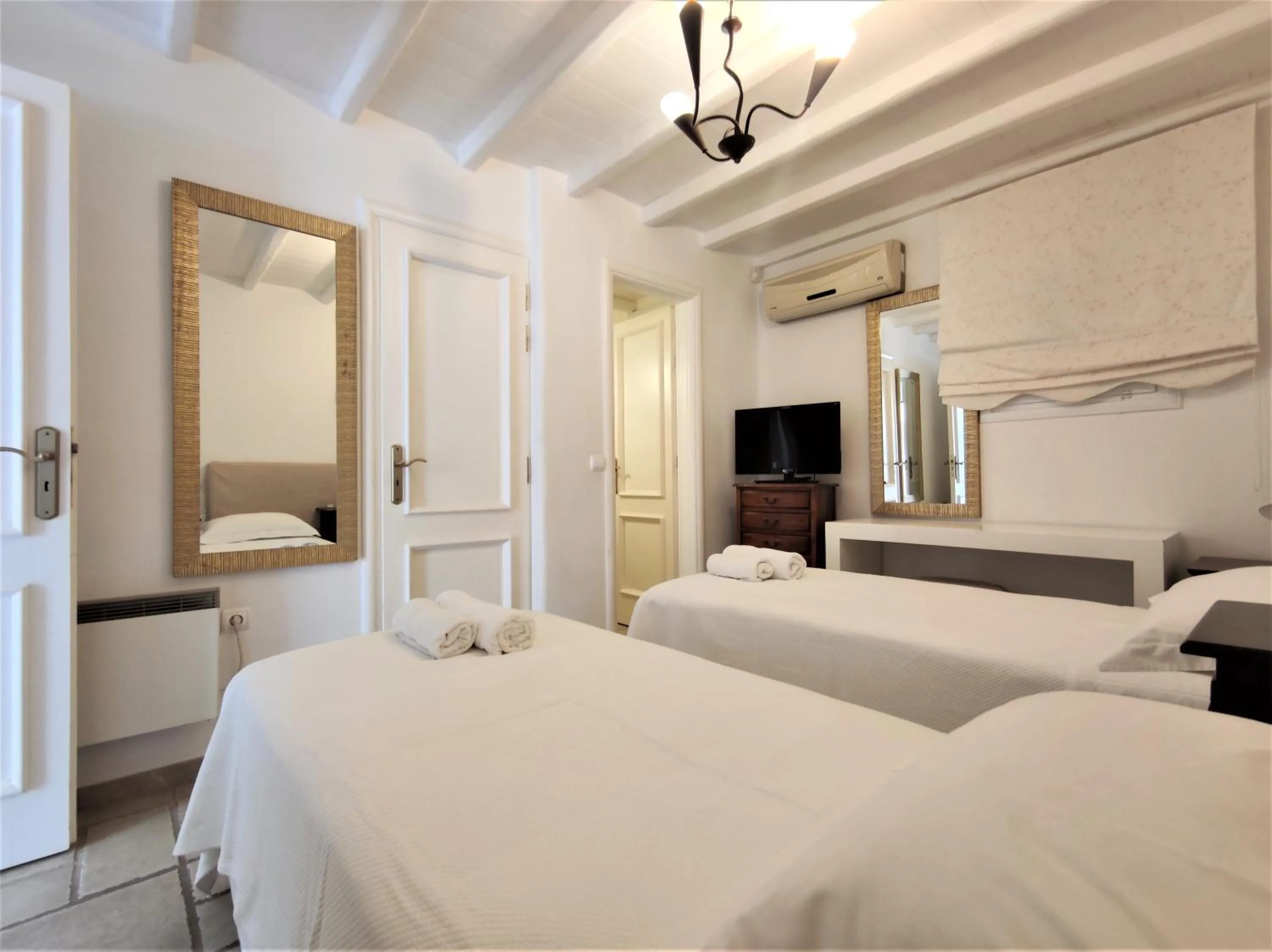 TV and multimedia in Mykonian Iros Suites & Villas