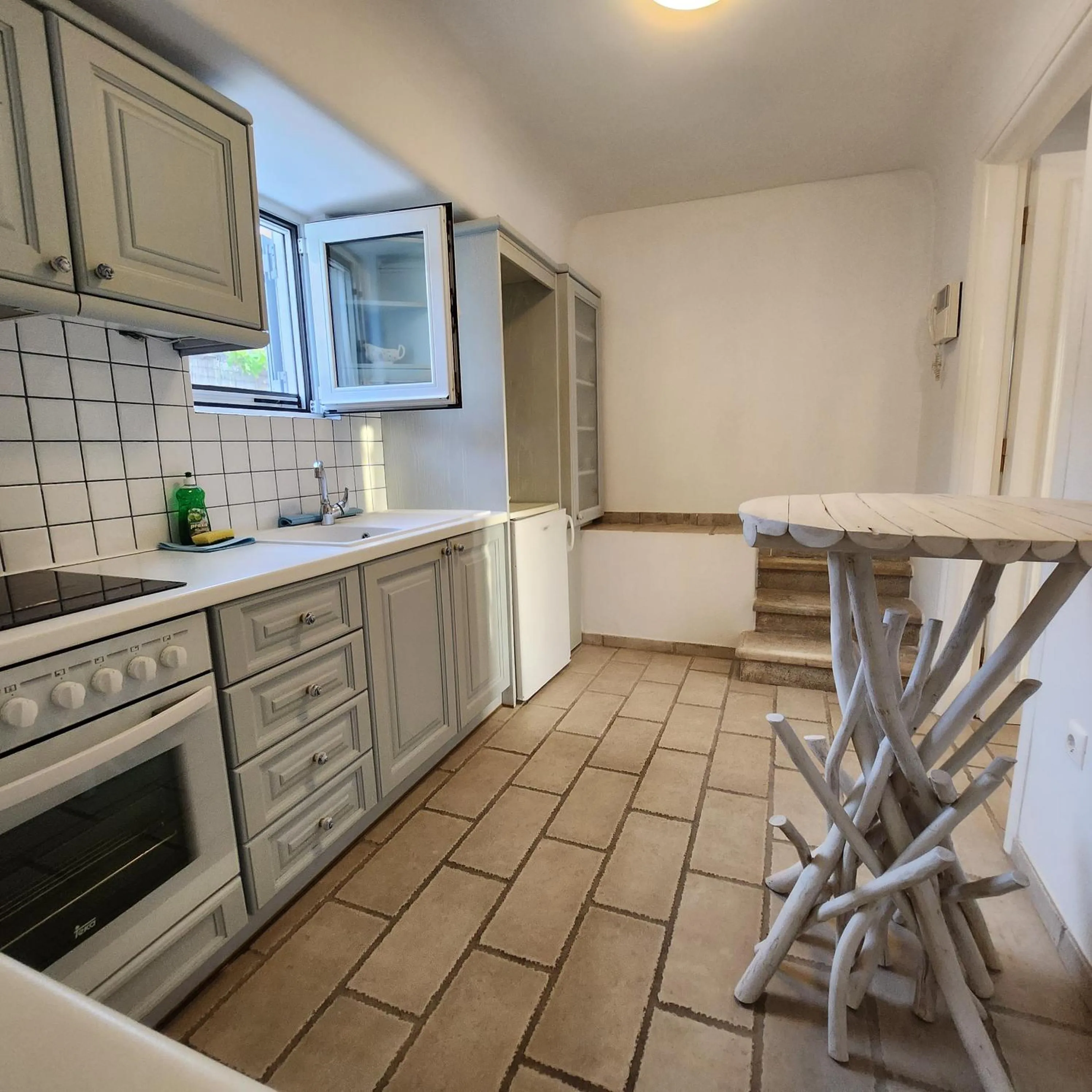 Kitchen or kitchenette in Mykonian Iros Suites & Villas