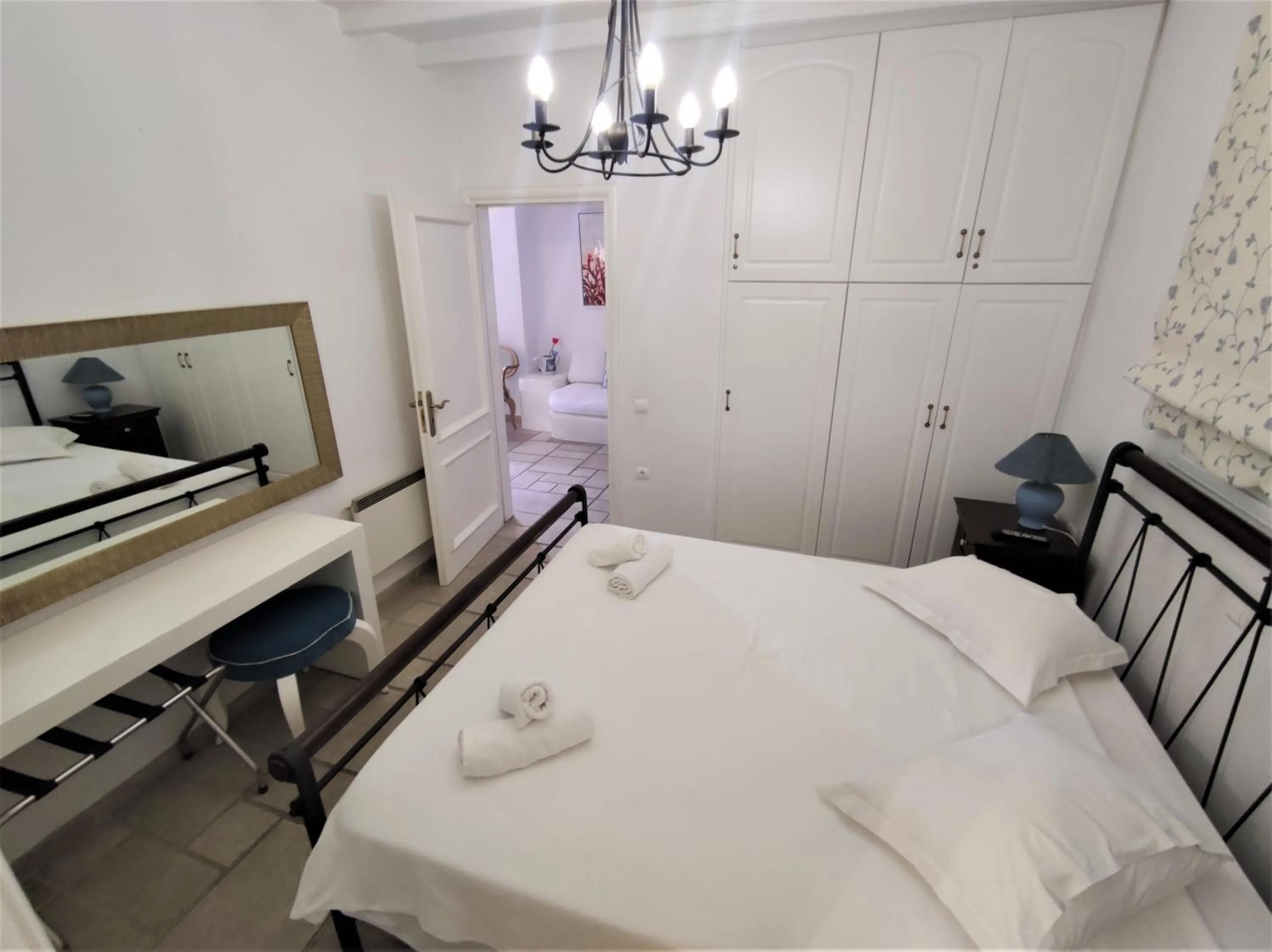 Bed in Mykonian Iros Suites & Villas