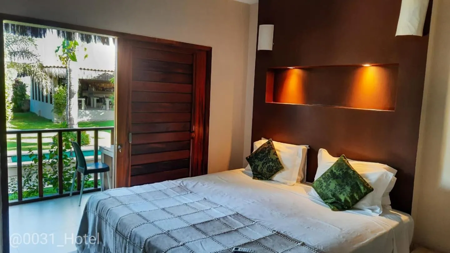 Bed in 0031 Boutique Hotel & Restaurant Cumbuco