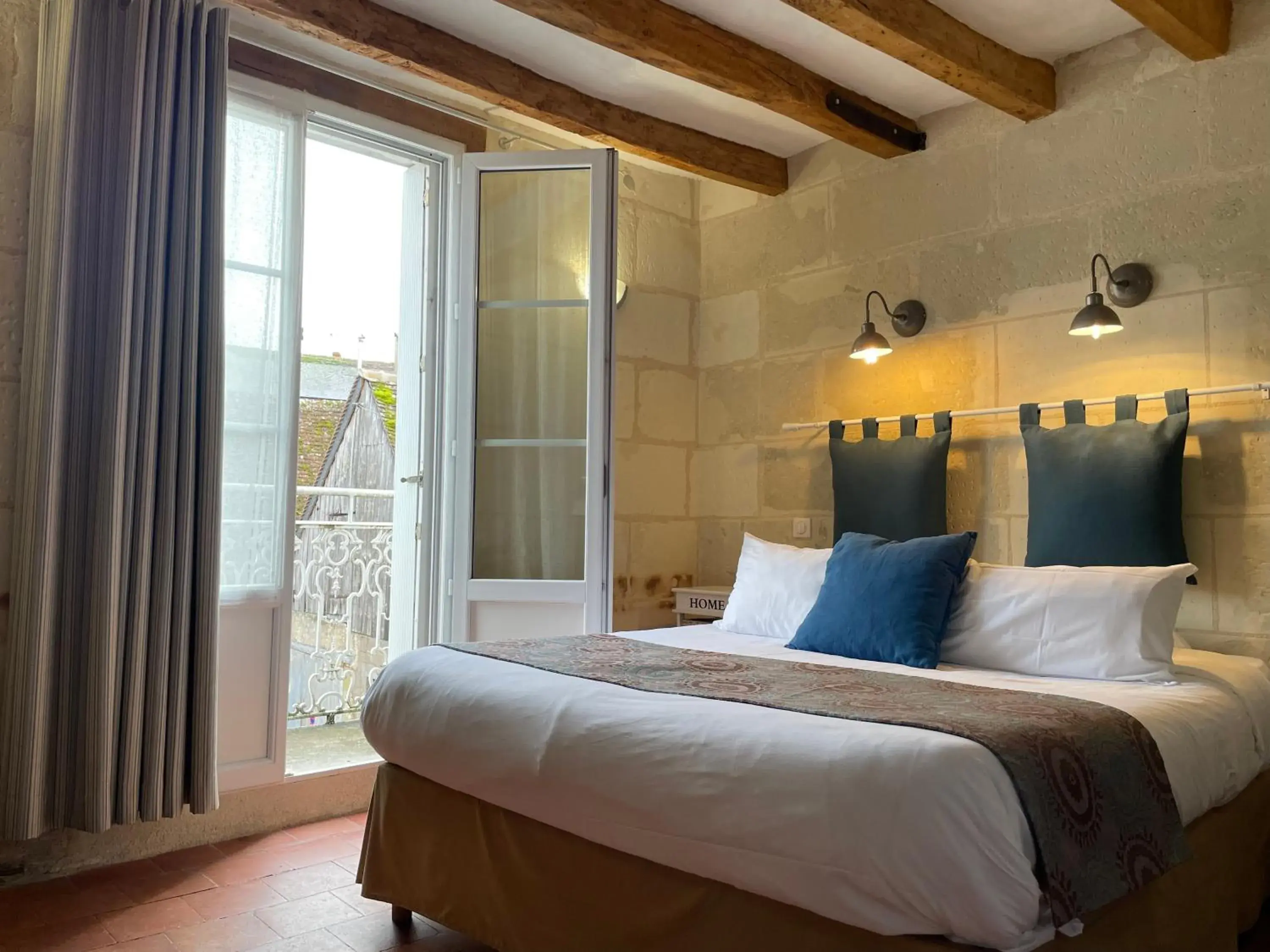 Photo of the whole room, Bed in Logis Auberge Le Colombien - Hôtel et Restaurant Photo of the whole room, Bed in Logis Auberge Le Colombien - Hôtel et Restaurant