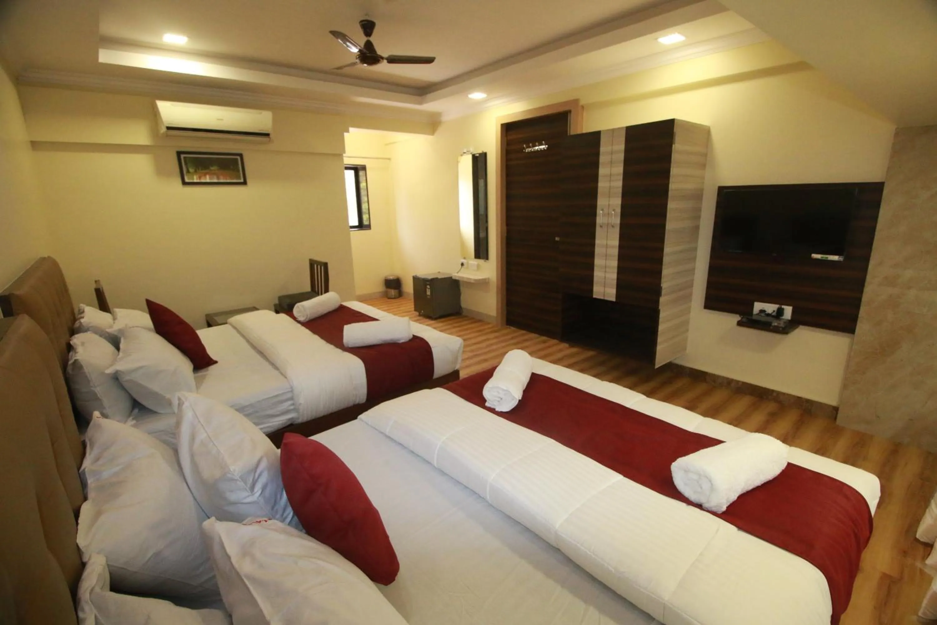TV and multimedia, Bed in Hotel Alfa International Near Nanavati Hospital Mumbai Near Airport Mumbai Near Juhu Beach