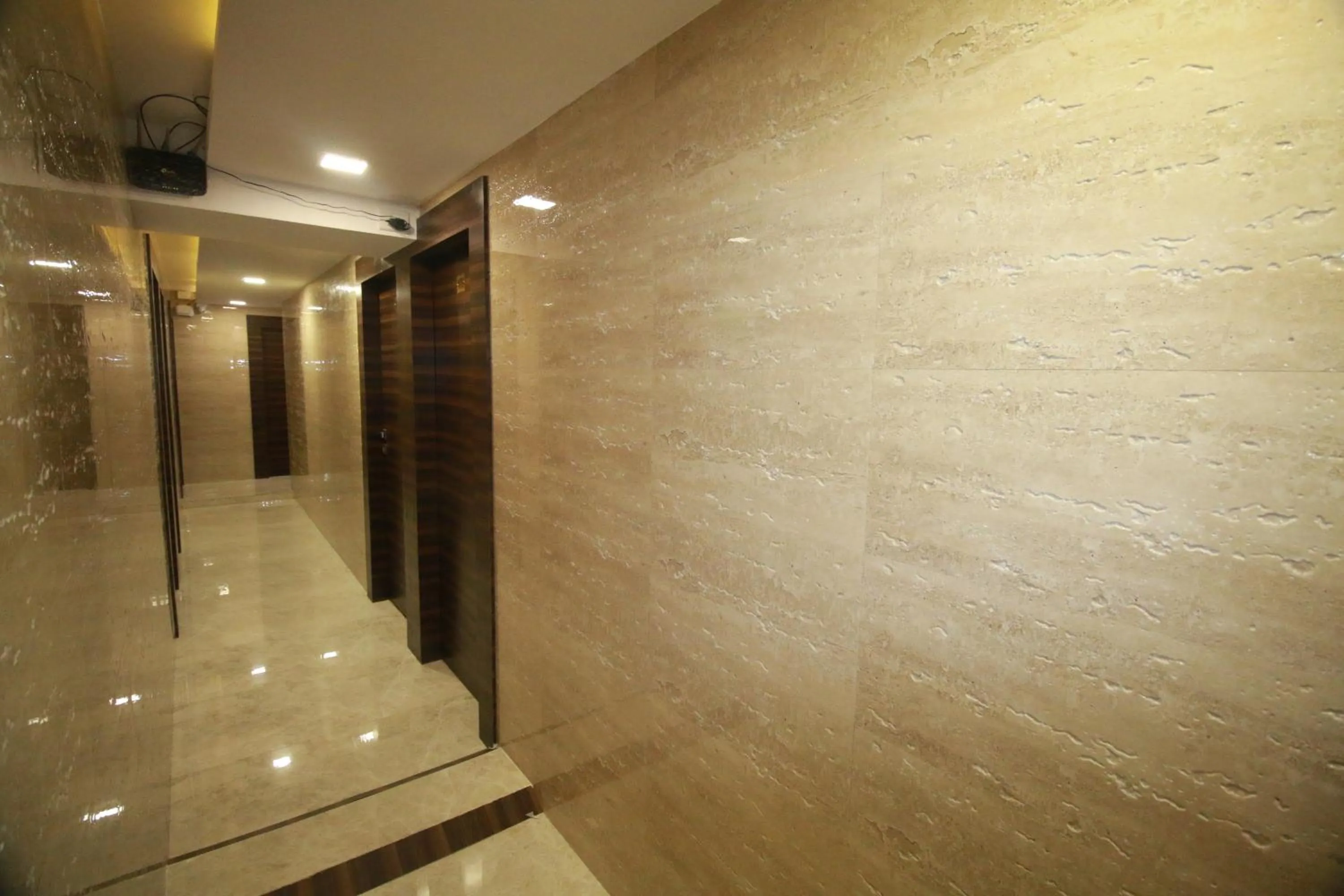 Lobby or reception in Hotel Alfa International Near Nanavati Hospital Mumbai Near Airport Mumbai Near Juhu Beach