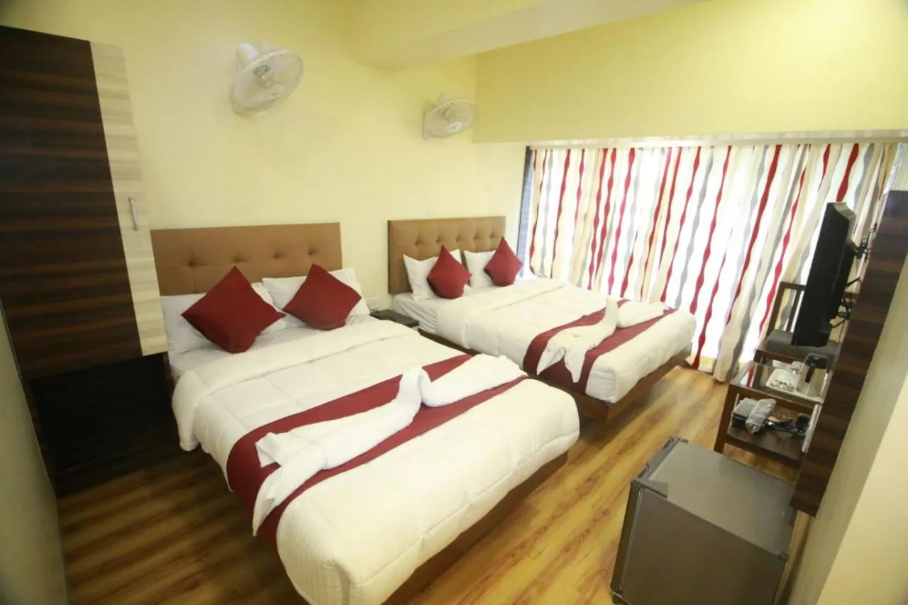 Bed in Hotel Alfa International Near Nanavati Hospital Mumbai Near Airport Mumbai Near Juhu Beach