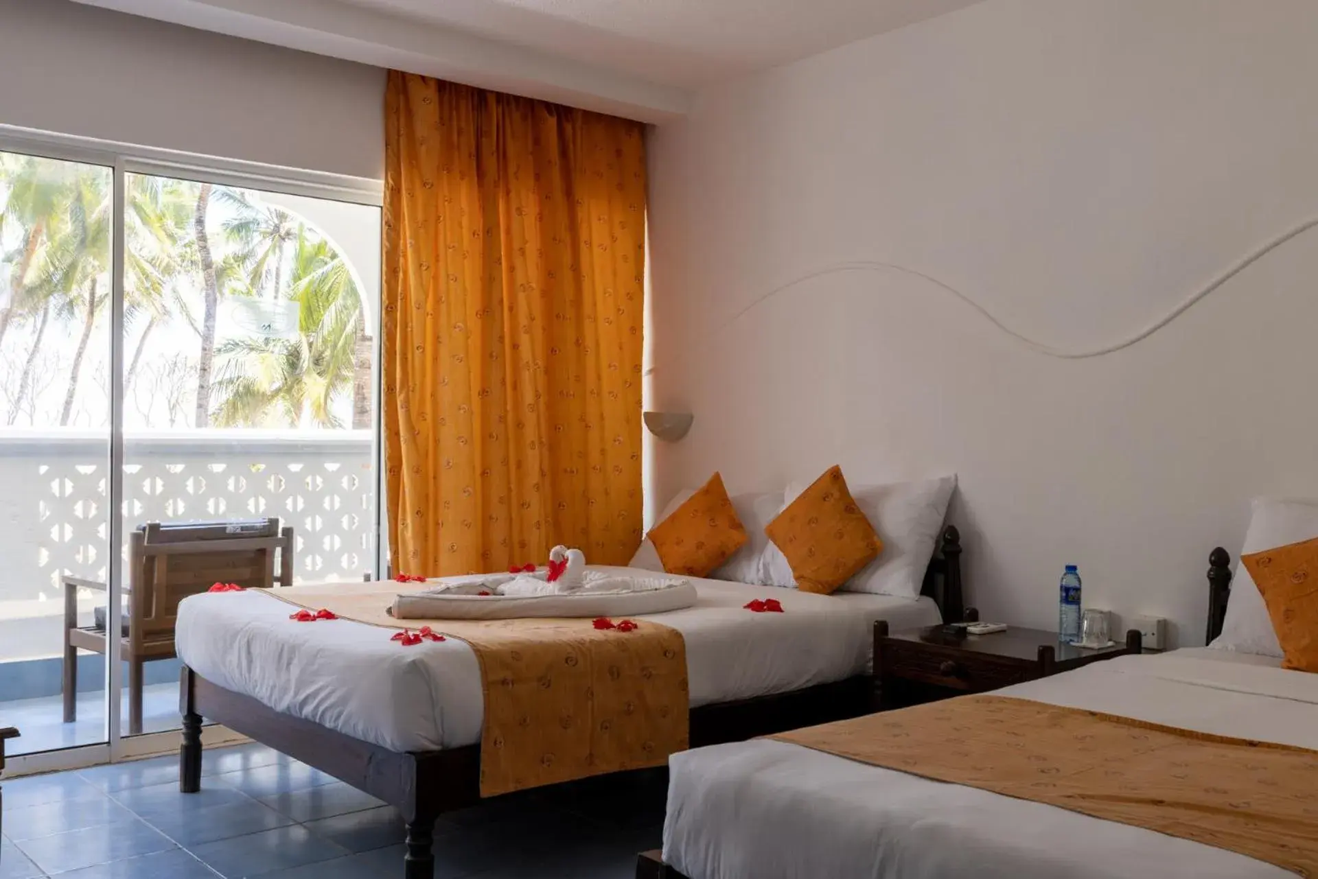 Bedroom, Bed in Sun N Sand Beach Resort Bedroom, Bed in Sun N Sand Beach Resort