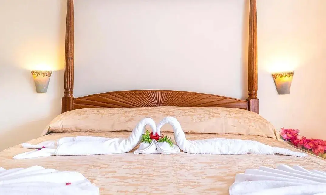 Bed in Sun N Sand Beach Resort Bed in Sun N Sand Beach Resort