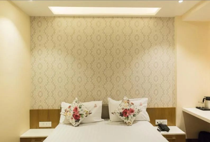Bed in Hotel Sangat Regency