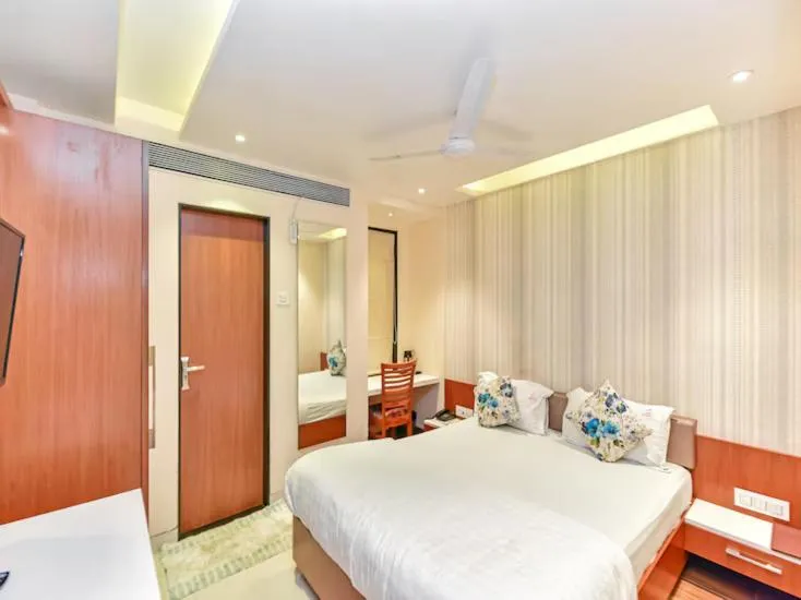 Bed in Hotel Sangat Regency