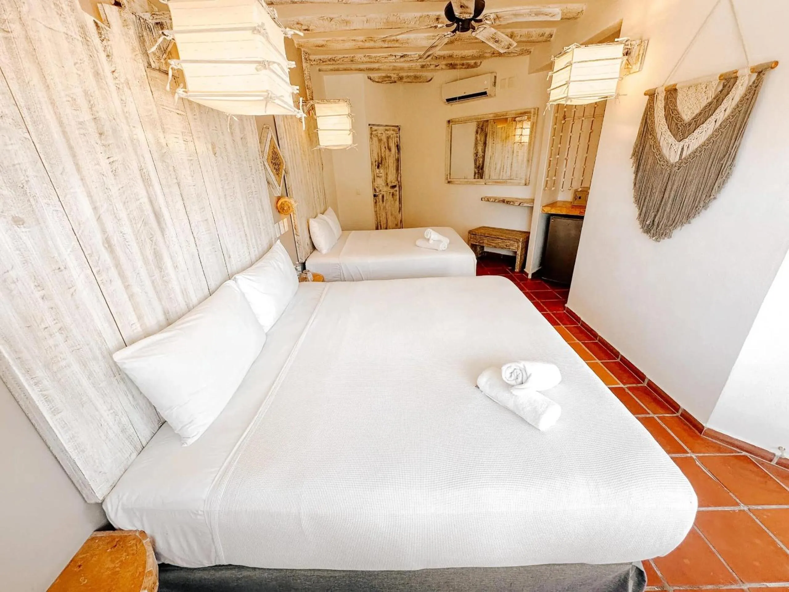 Bed in Holbox Dream Beachfront Hotel