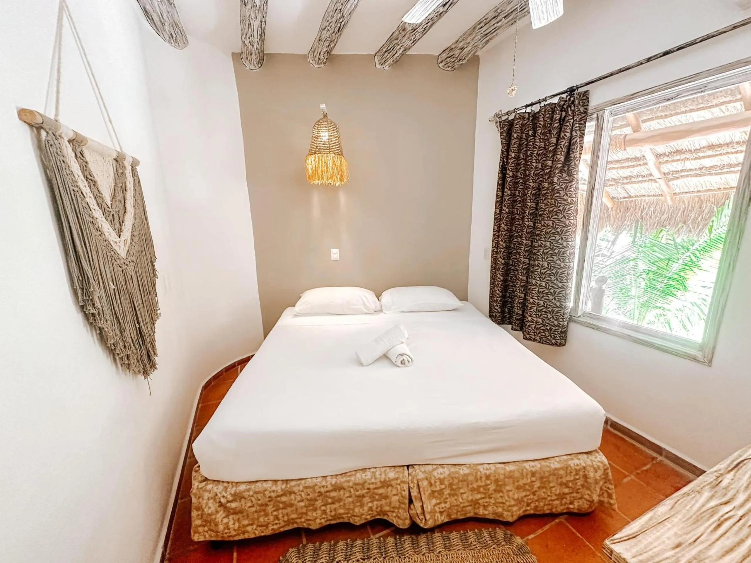 Bed in Holbox Dream Beachfront Hotel