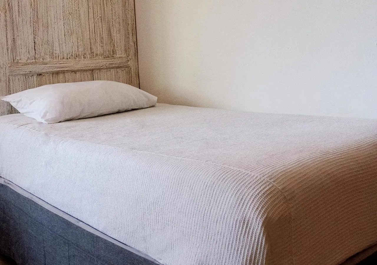 Bed in Holbox Dream Beachfront Hotel