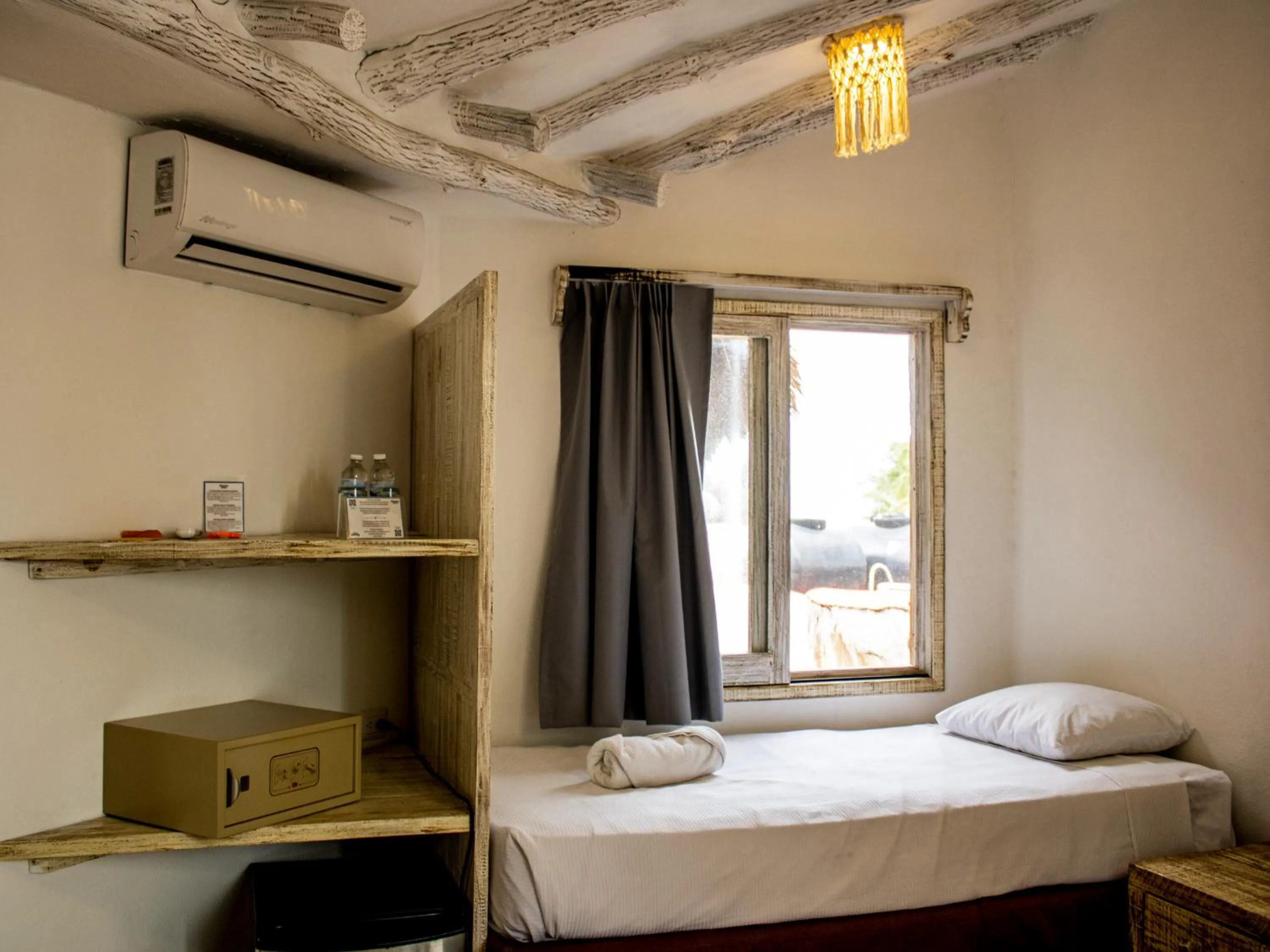 Bed in Holbox Dream Beachfront Hotel