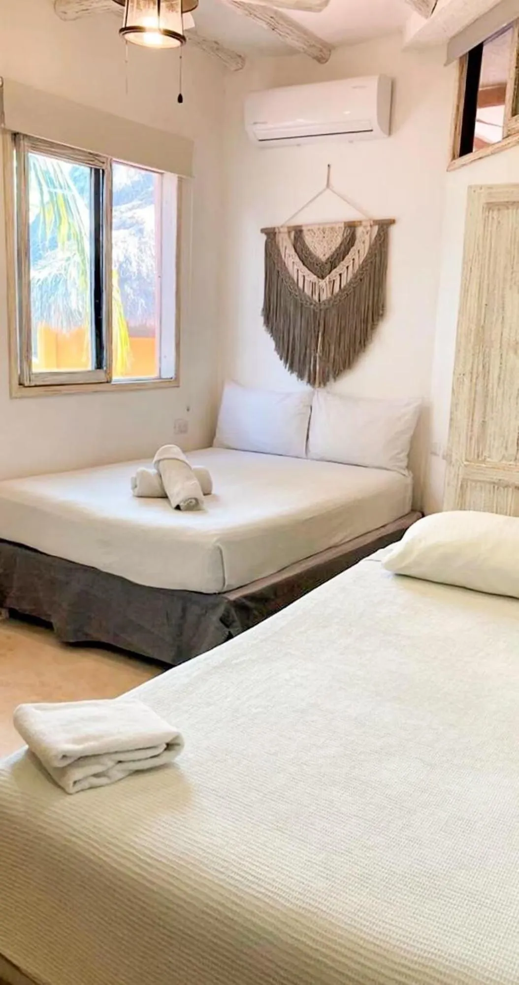 Bed in Holbox Dream Beachfront Hotel