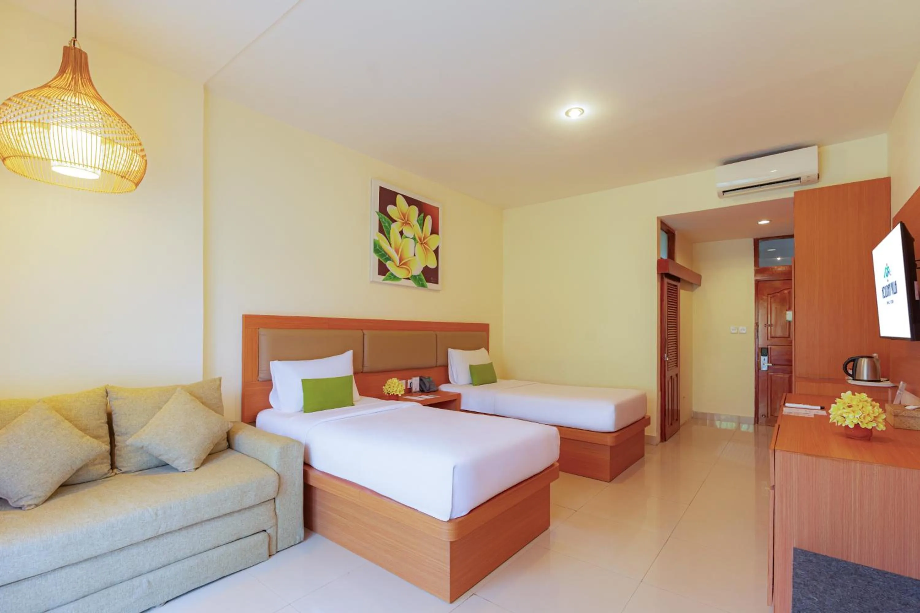 Bed in Wina Holiday Villa Kuta Bali