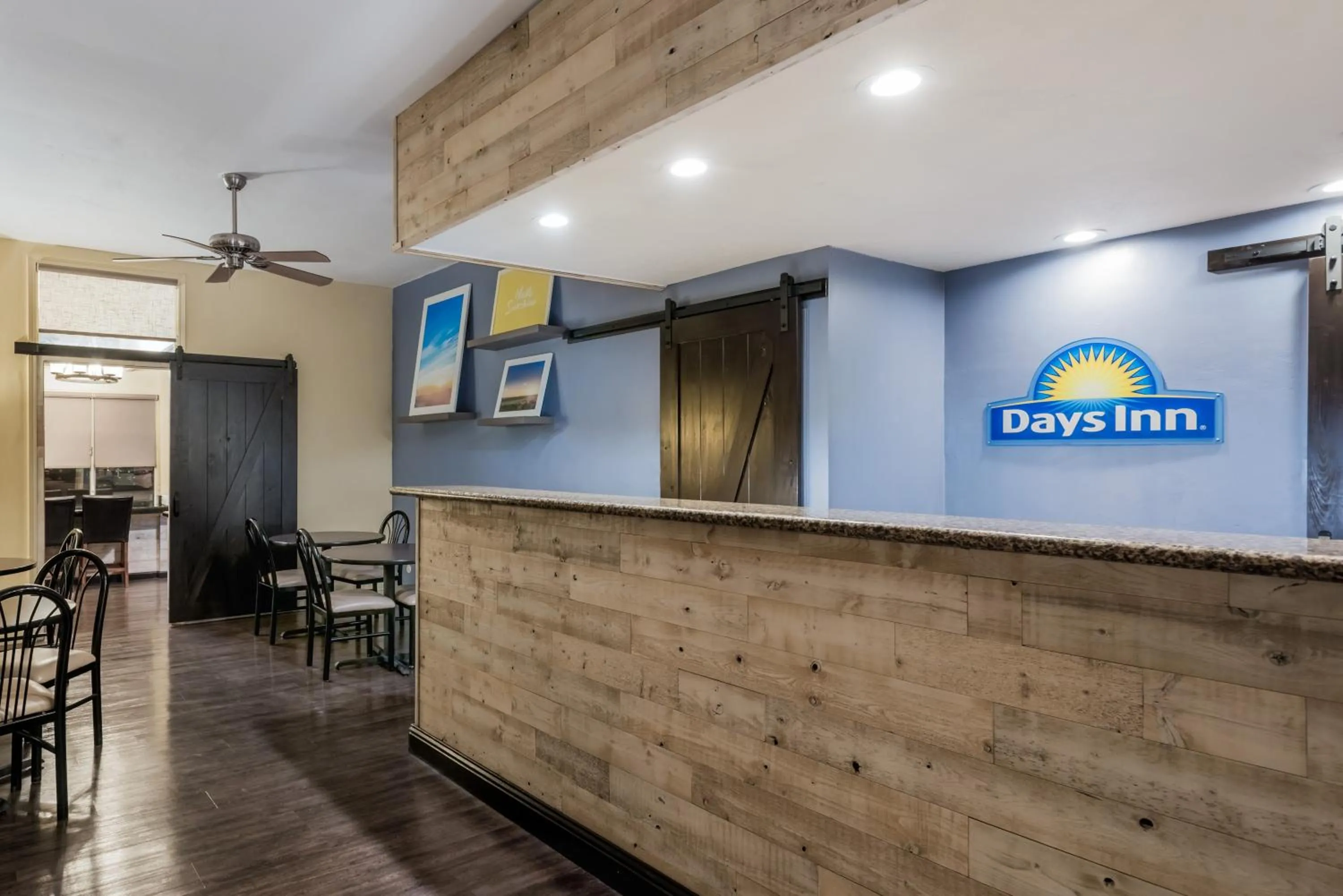 Property logo or sign in Days Inn & Suites by Wyndham Lodi