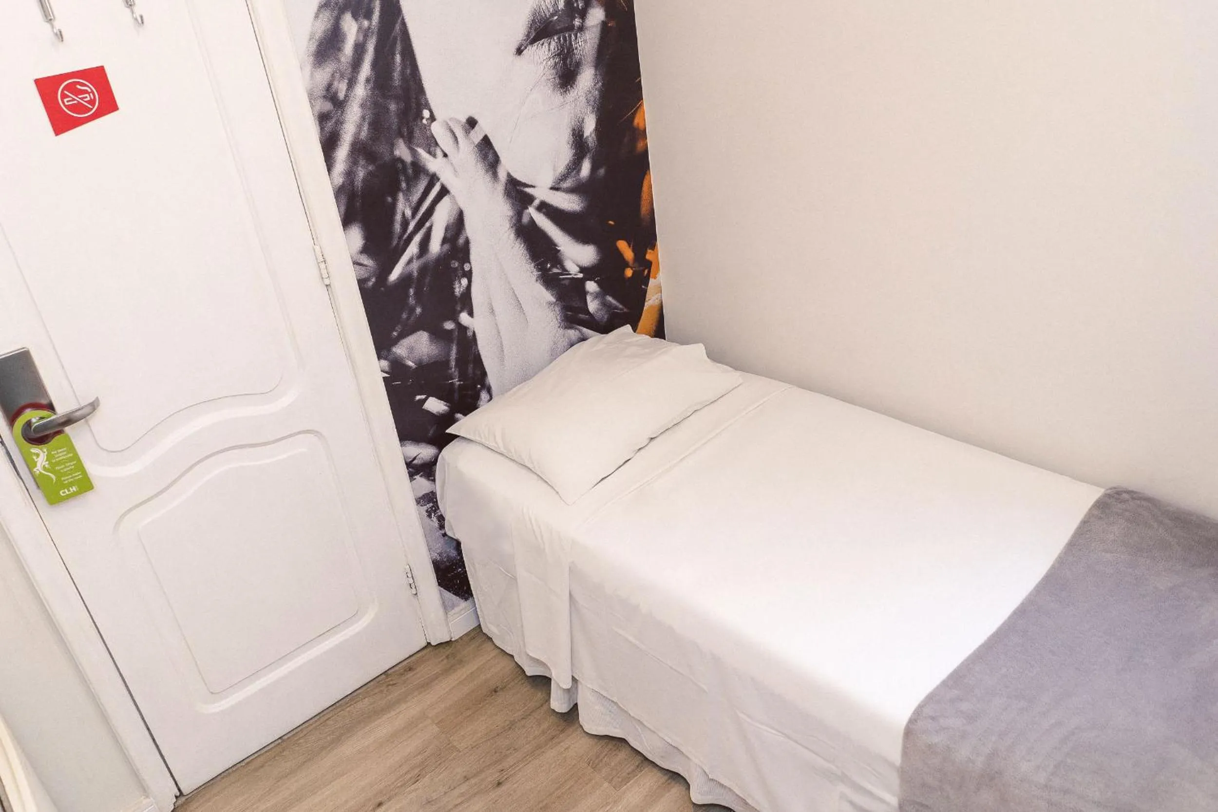 Photo of the whole room, Bed in CLH Suites Domingos Ferreira