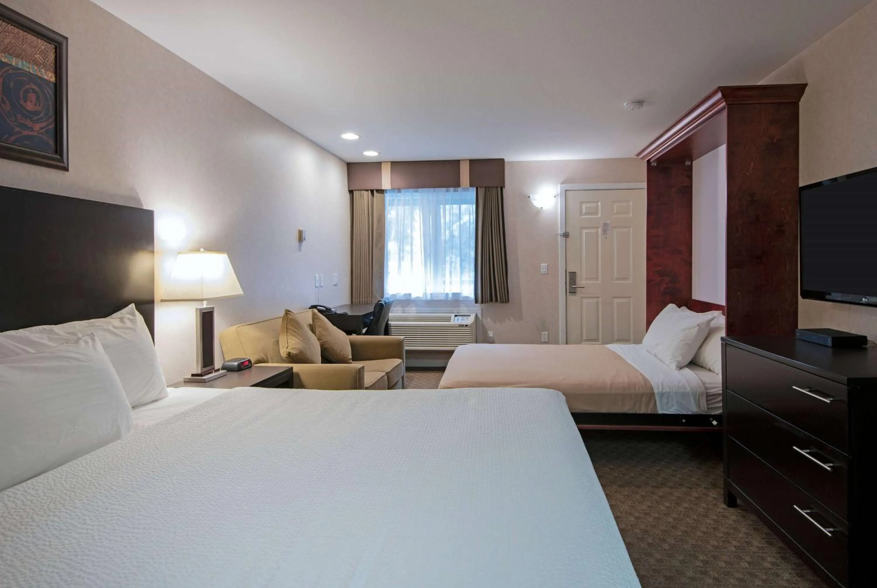 Photo of the whole room, Bed in Travelodge by Wyndham Kamloops Mountview