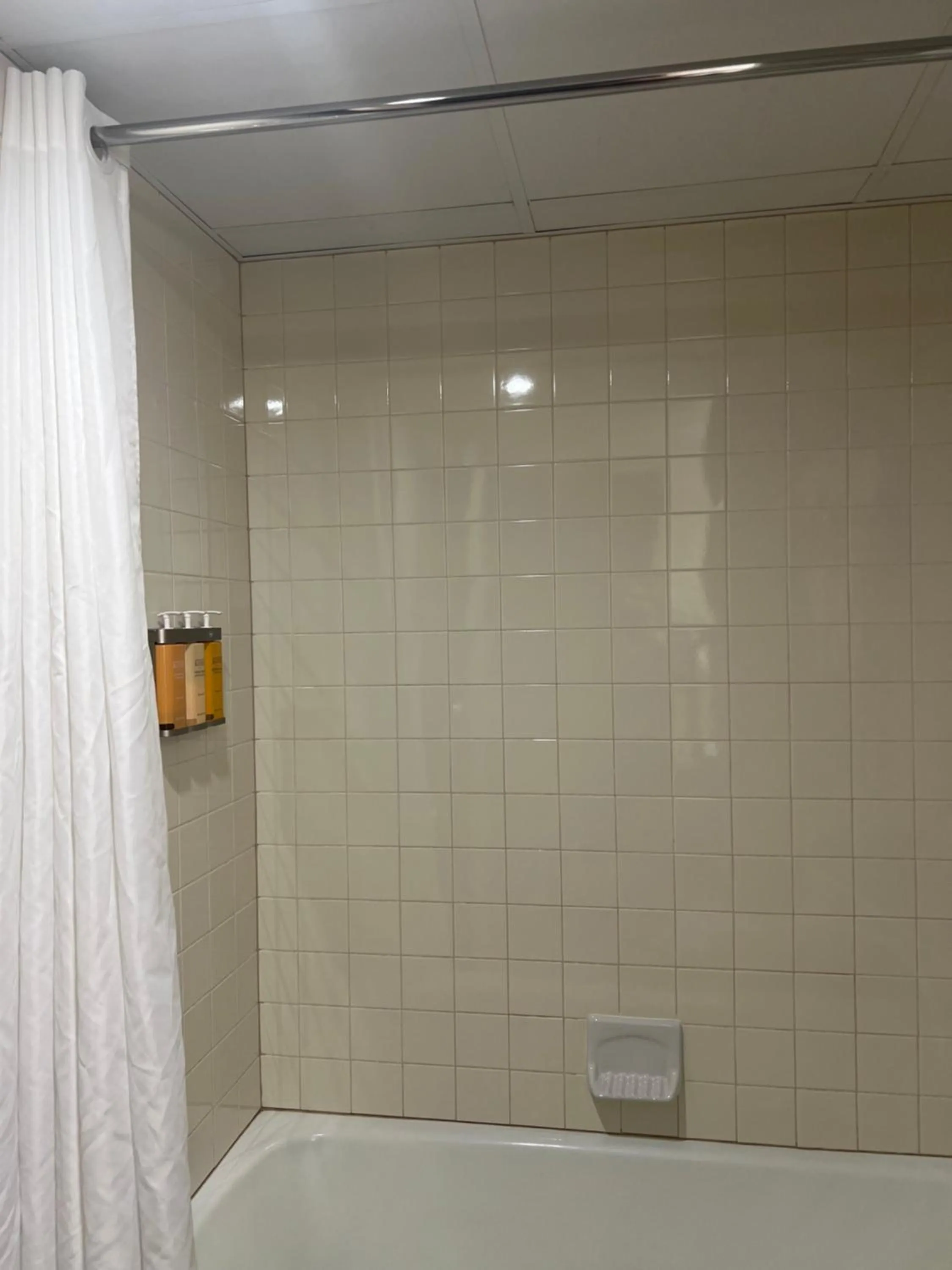 Bathroom in The Stables Inn & Suites