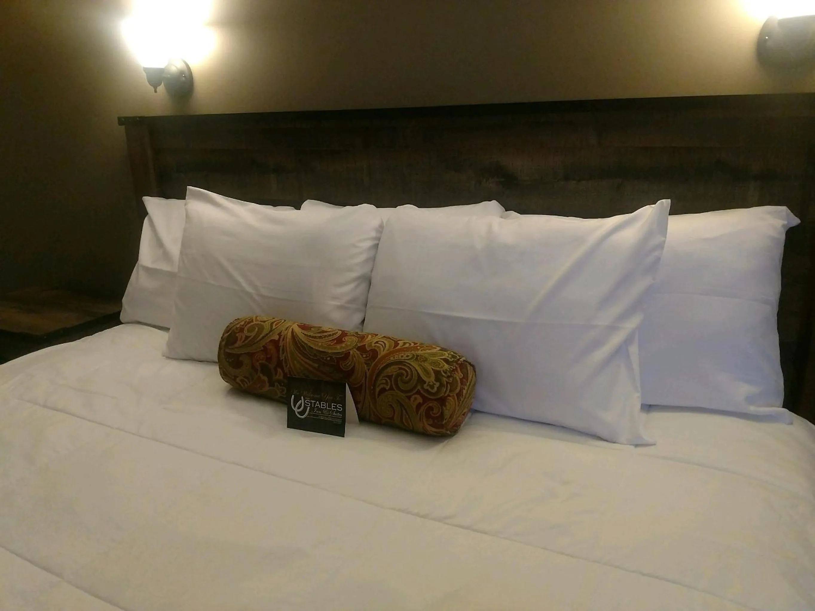 Bedroom, Bed in The Stables Inn & Suites