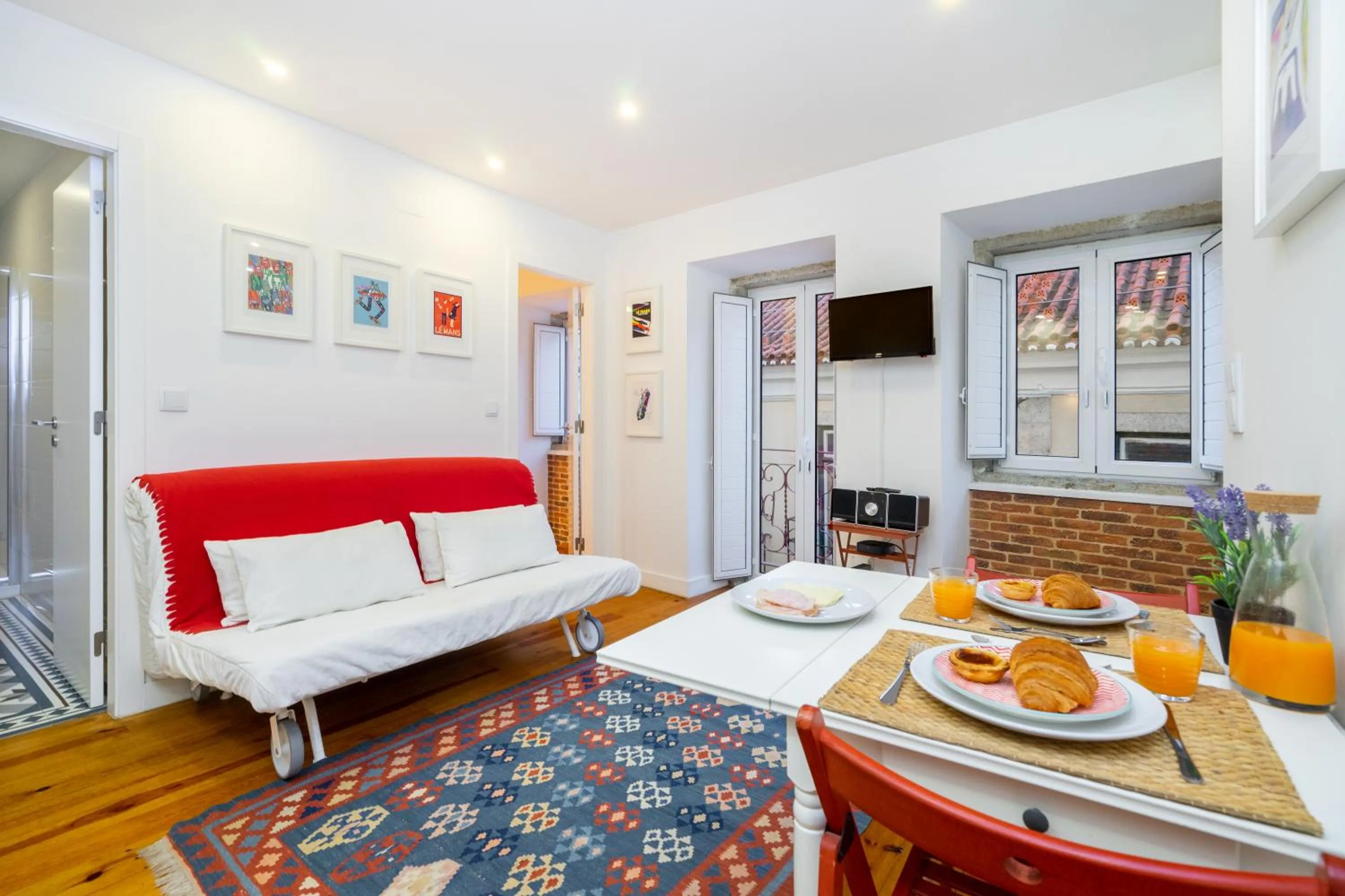Living room, Bed in WHome | Paz Downtown Apartment #2