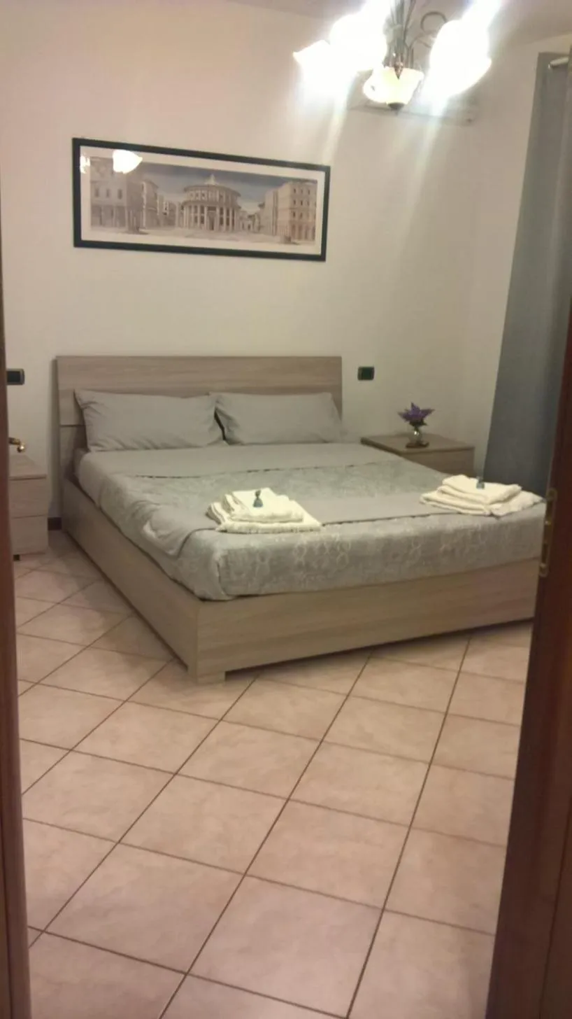 Bedroom, Bed in ACERO ROSSO B&B in Franciacorta