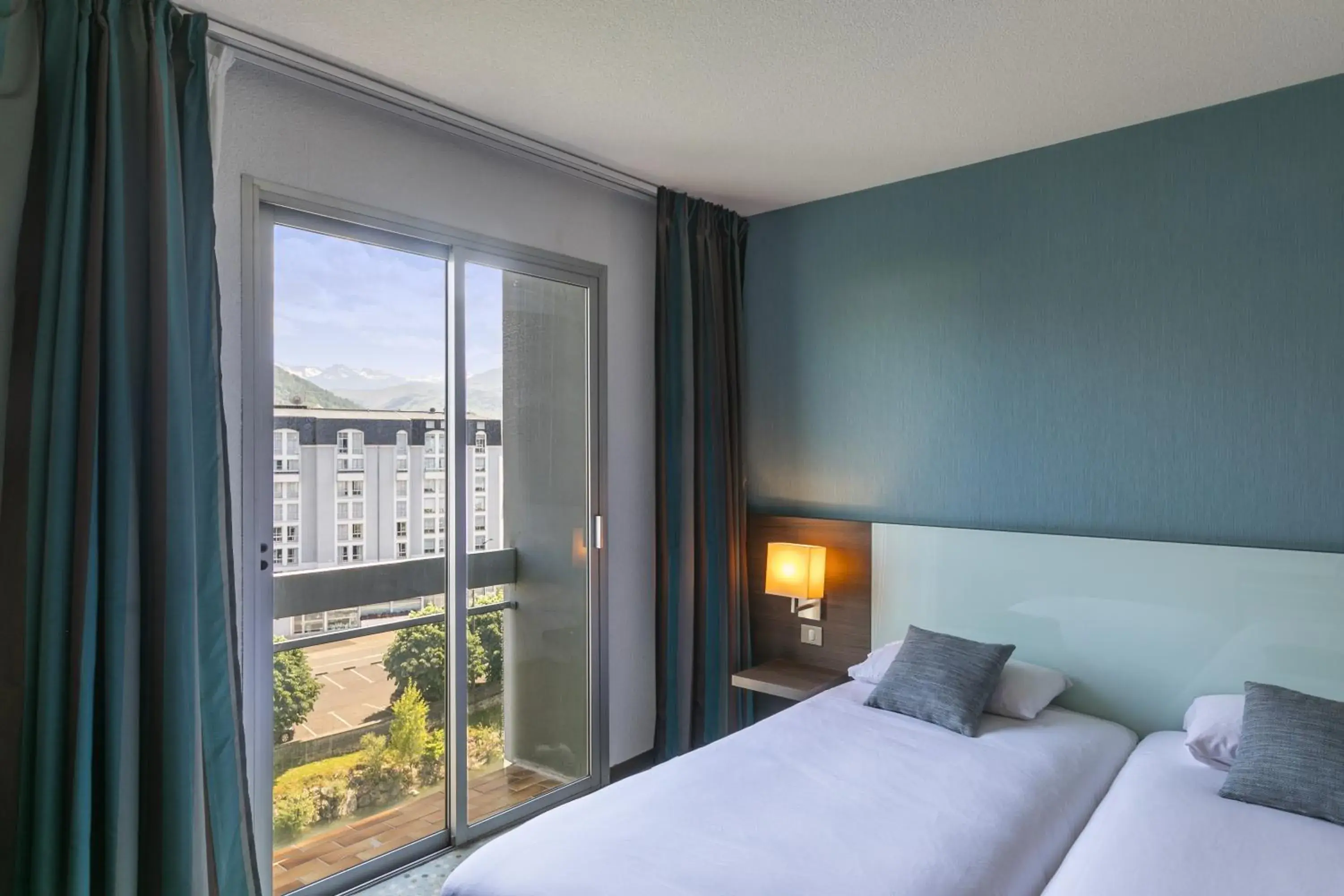 Photo of the whole room, Bed in Hôtel Miramont Photo of the whole room, Bed in Hôtel Miramont