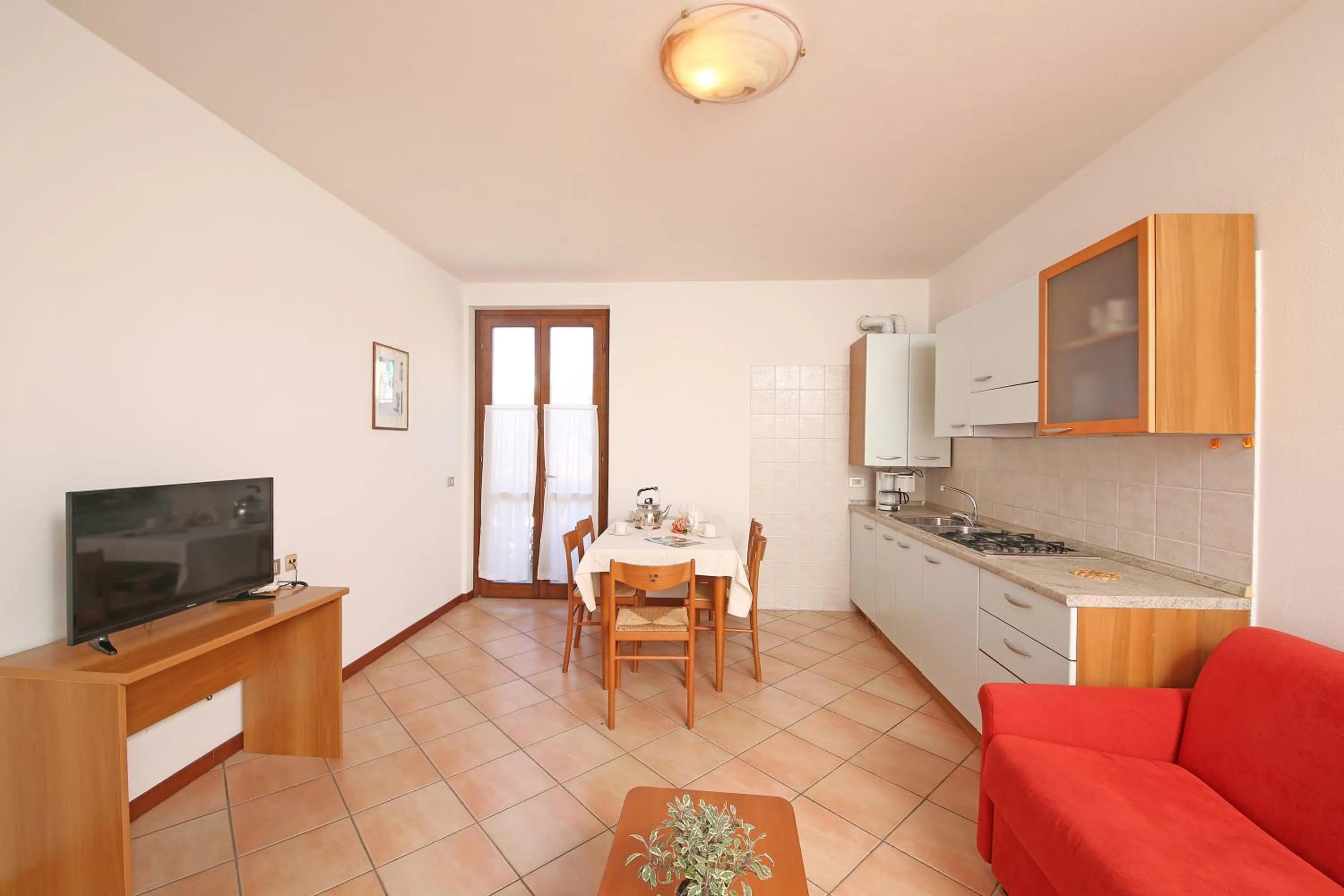 Communal lounge/ TV room in Hotel Residence Panorama La Forca, GTSGroup