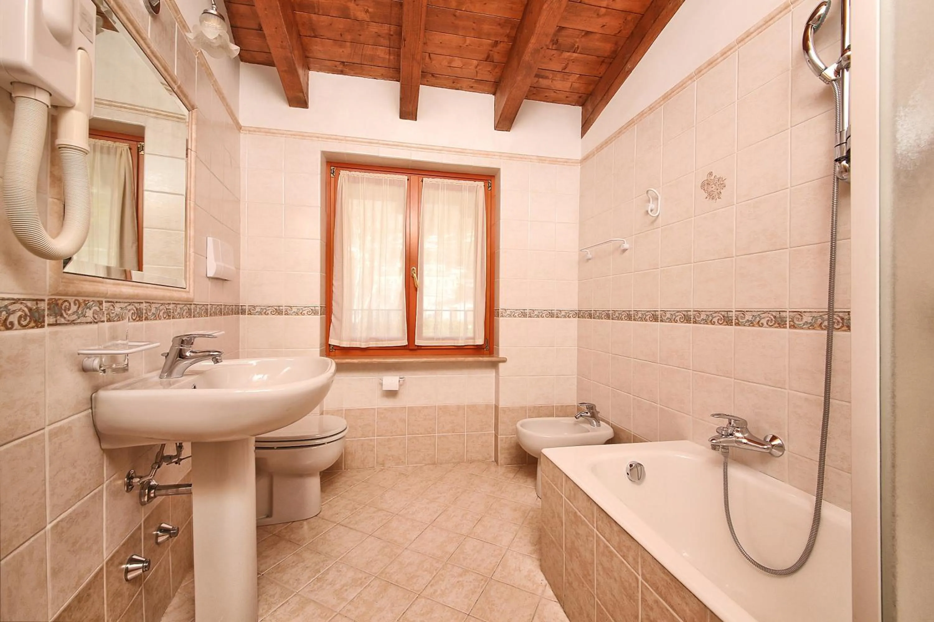 Bathroom in Residence Casa Gardola, GTSGroup