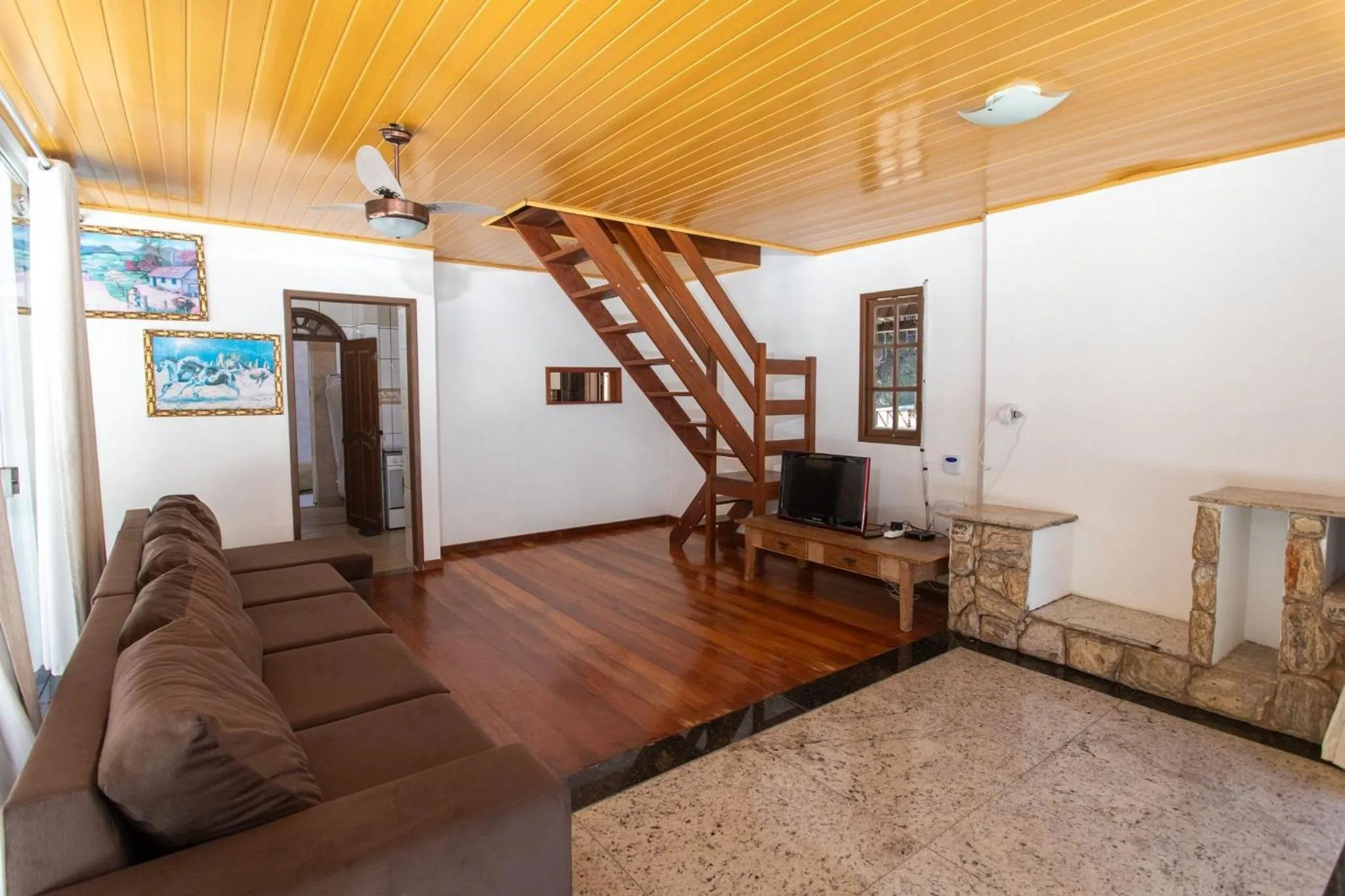 Living room in Sítio Cinco Folhas, recanto com vista pra montanha