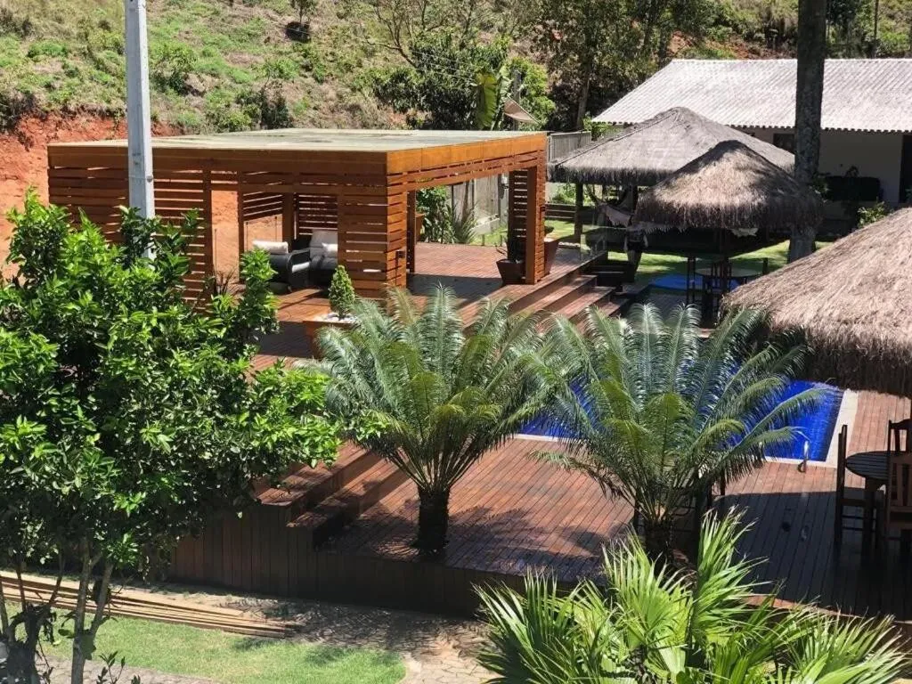 Garden in Sítio Cinco Folhas, recanto com vista pra montanha